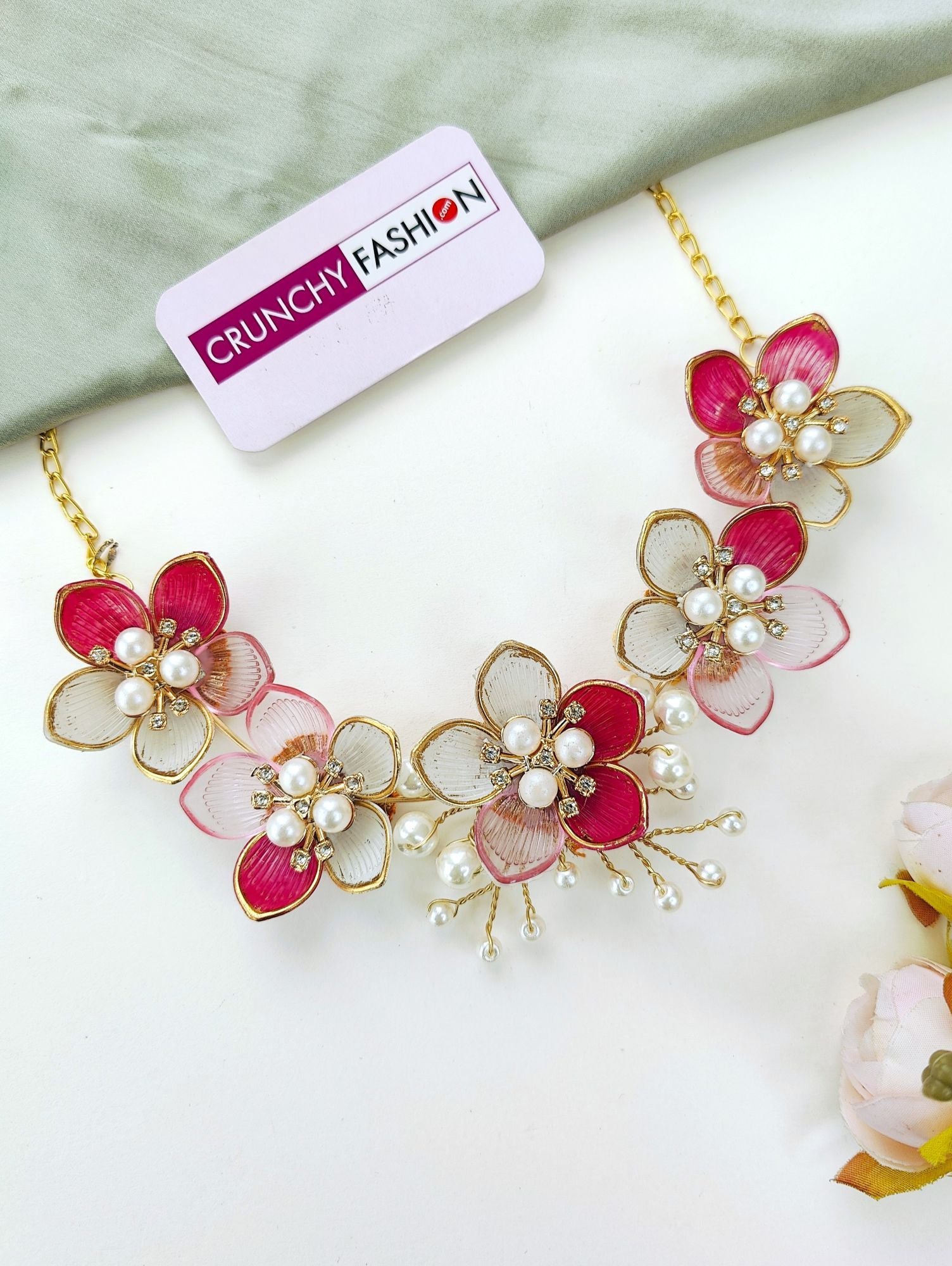 Handcrafted green-pink floral resin bridal jewellery set with gold plating, ideal for haldi-mehndi ceremonies in 2025