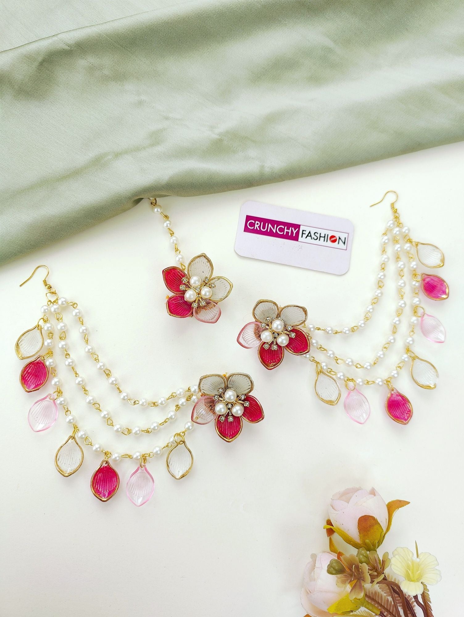 Handcrafted green-pink floral resin bridal jewellery set with gold plating, ideal for haldi-mehndi ceremonies in 2025