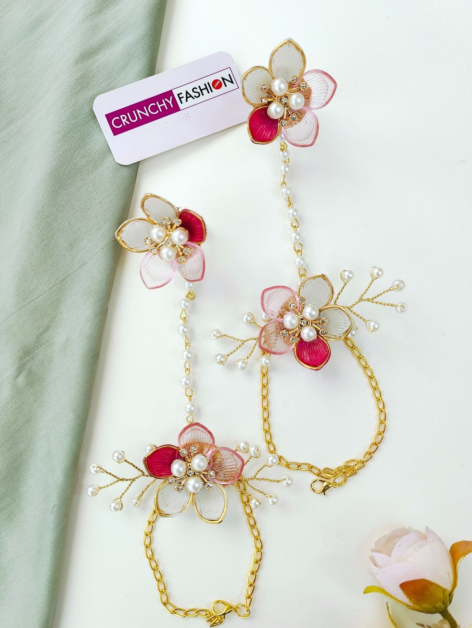 Handcrafted green-pink floral resin bridal jewellery set with gold plating, ideal for haldi-mehndi ceremonies in 2025