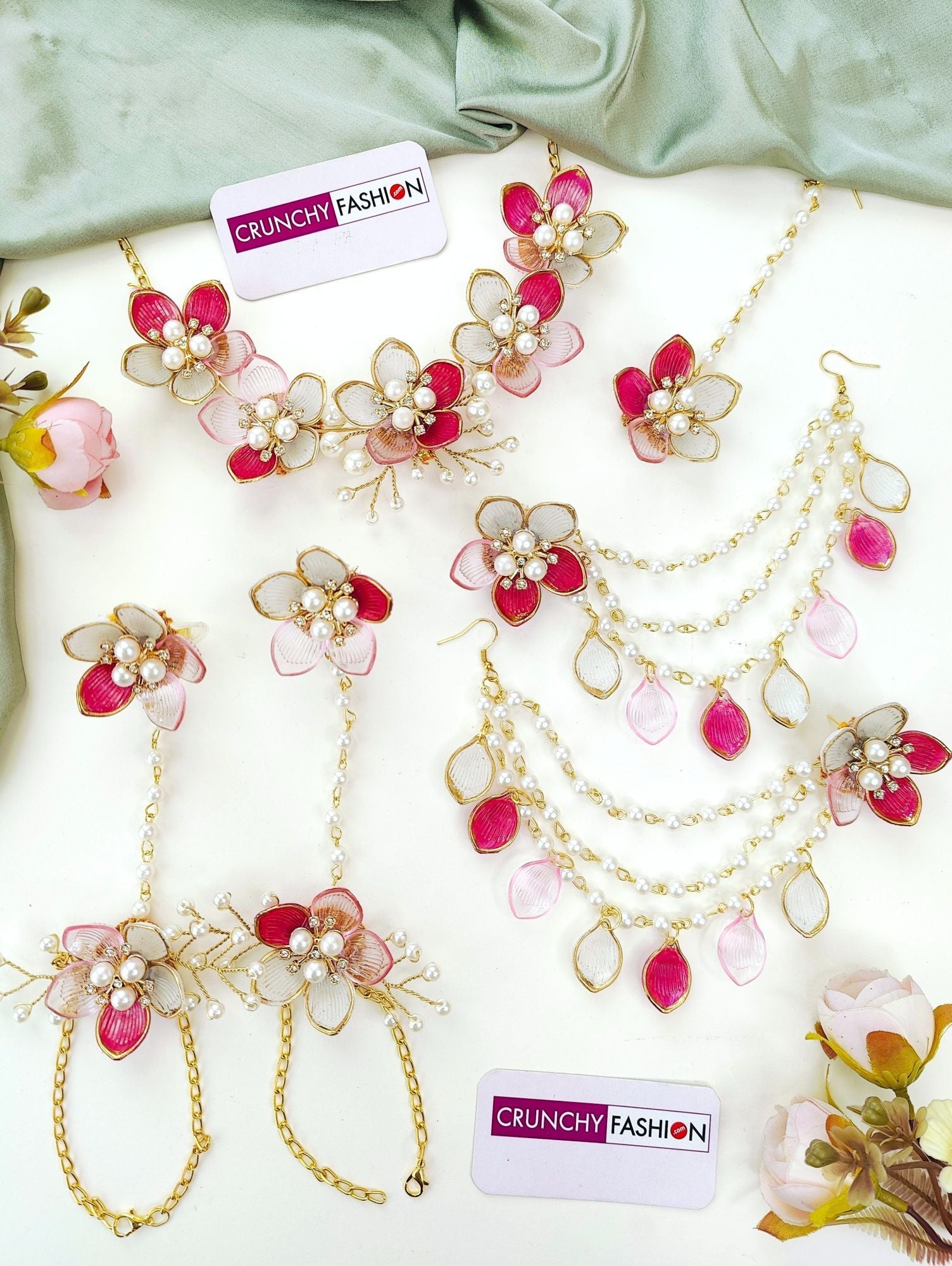Handcrafted green-pink floral resin bridal jewellery set with gold plating, ideal for haldi-mehndi ceremonies in 2025