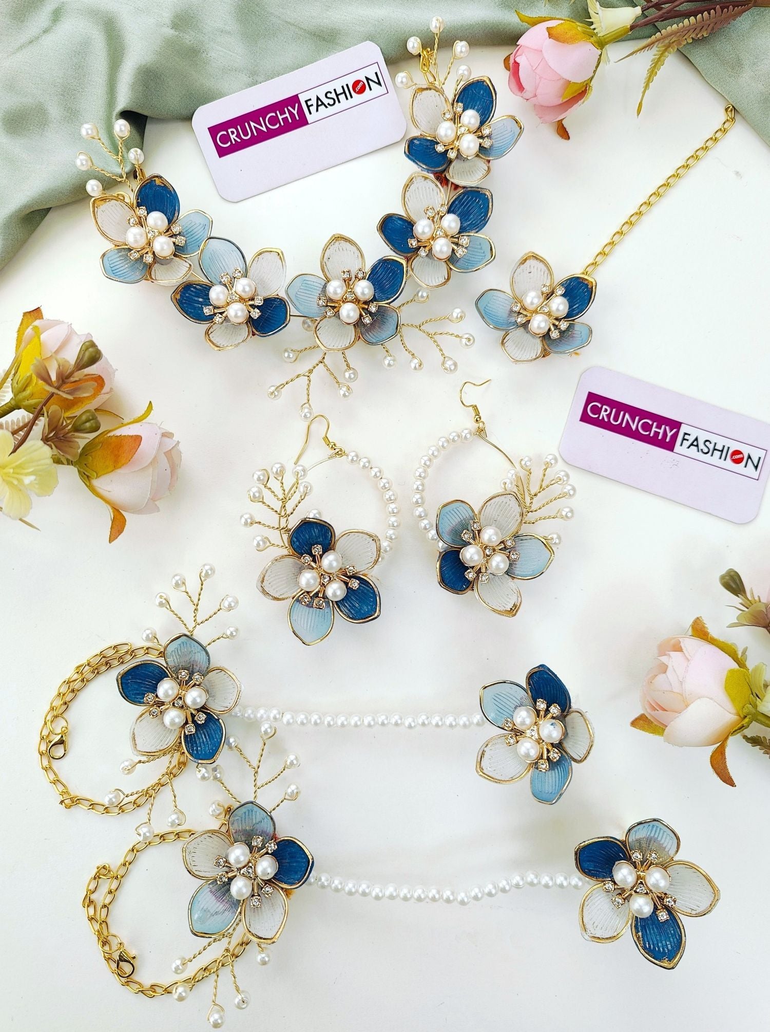 Handmade blue floral resin carnival jewellery set, ideal for haldi-mehndi brides, adorned with gold plating
