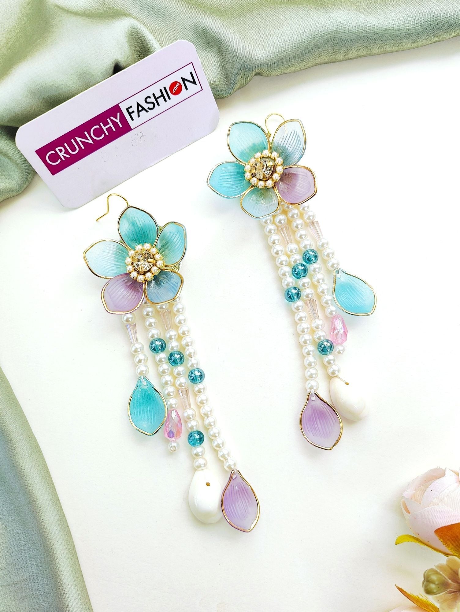 Powder blue bridal jewelry set with floral accents for haldi | mehndi, crafted from resin, beads, gold plating.