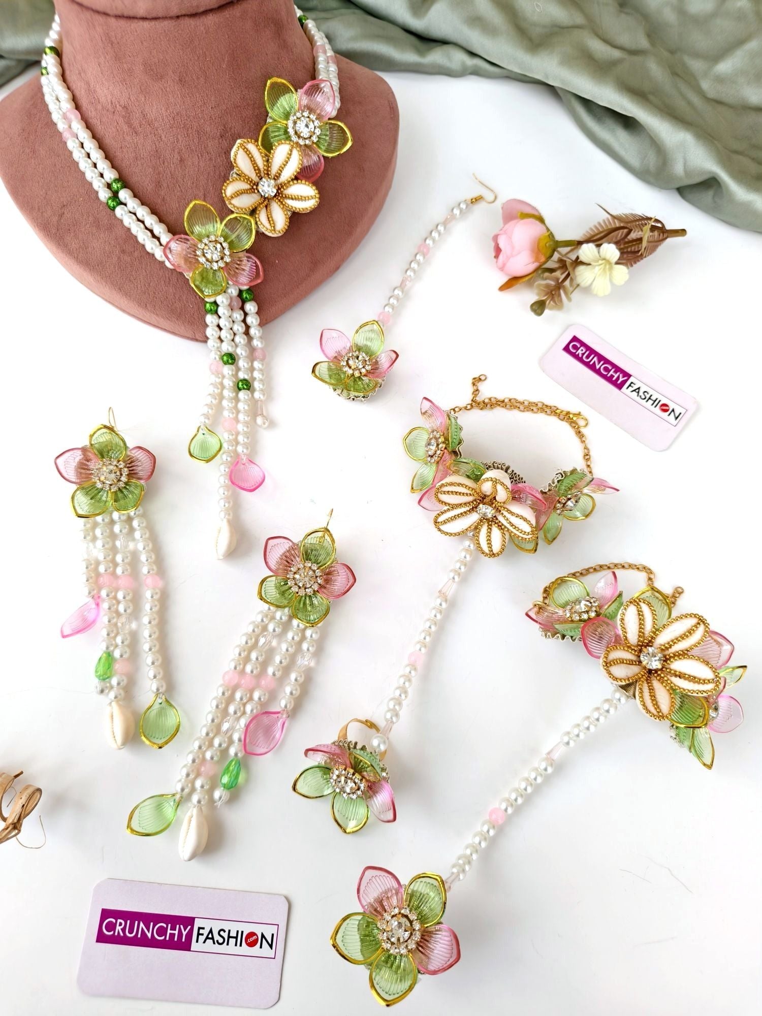 Green-pink floral sea shell bridal jewellery set for haldi mehndi