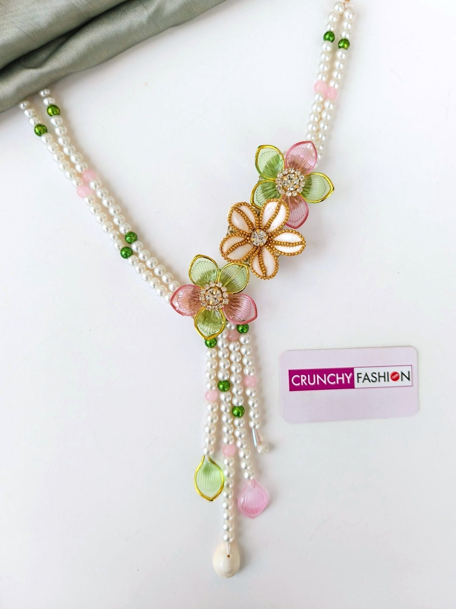 Green-pink floral sea shell bridal jewellery set for haldi mehndi