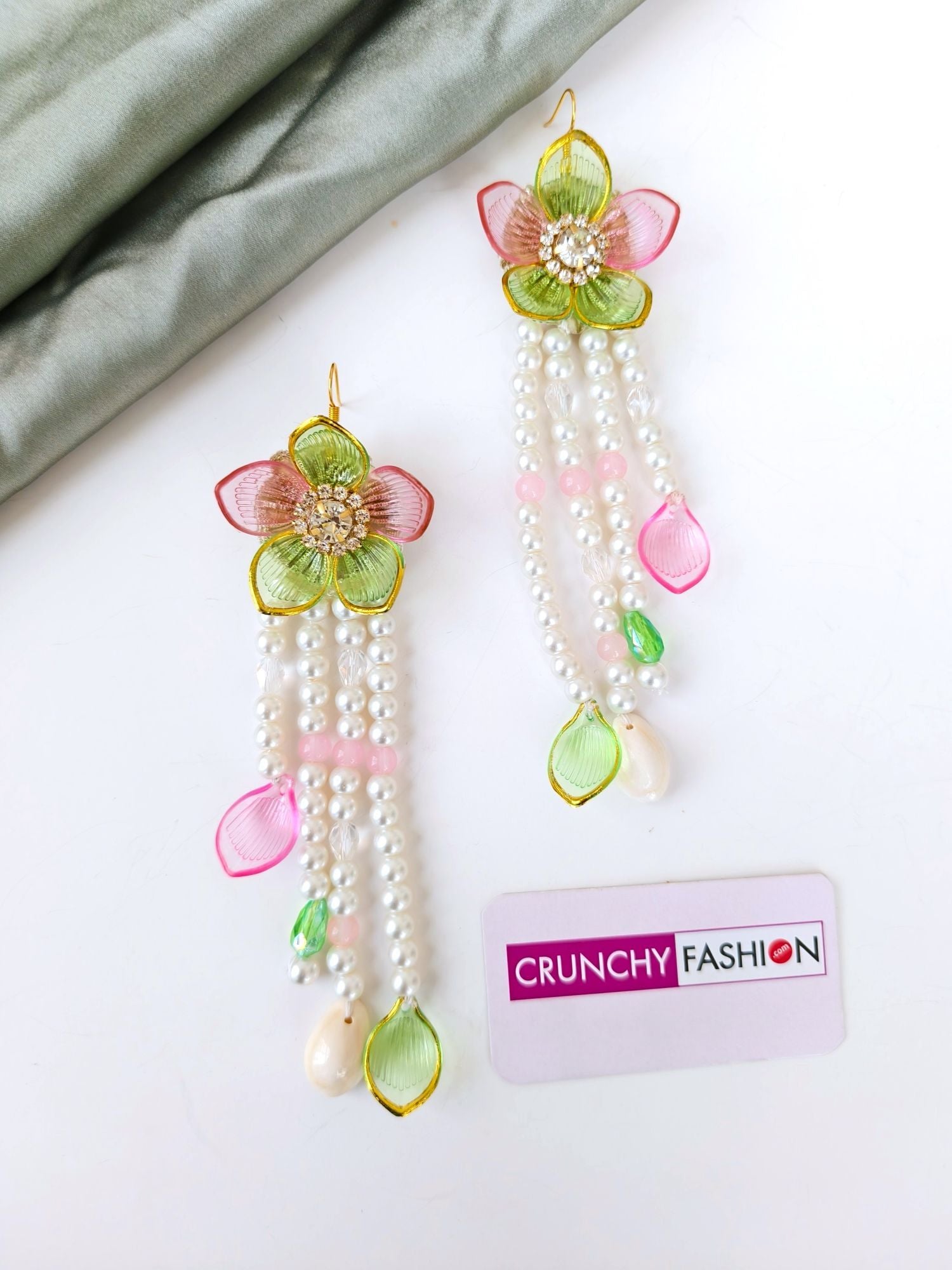 Green-pink floral sea shell bridal jewellery set for haldi mehndi