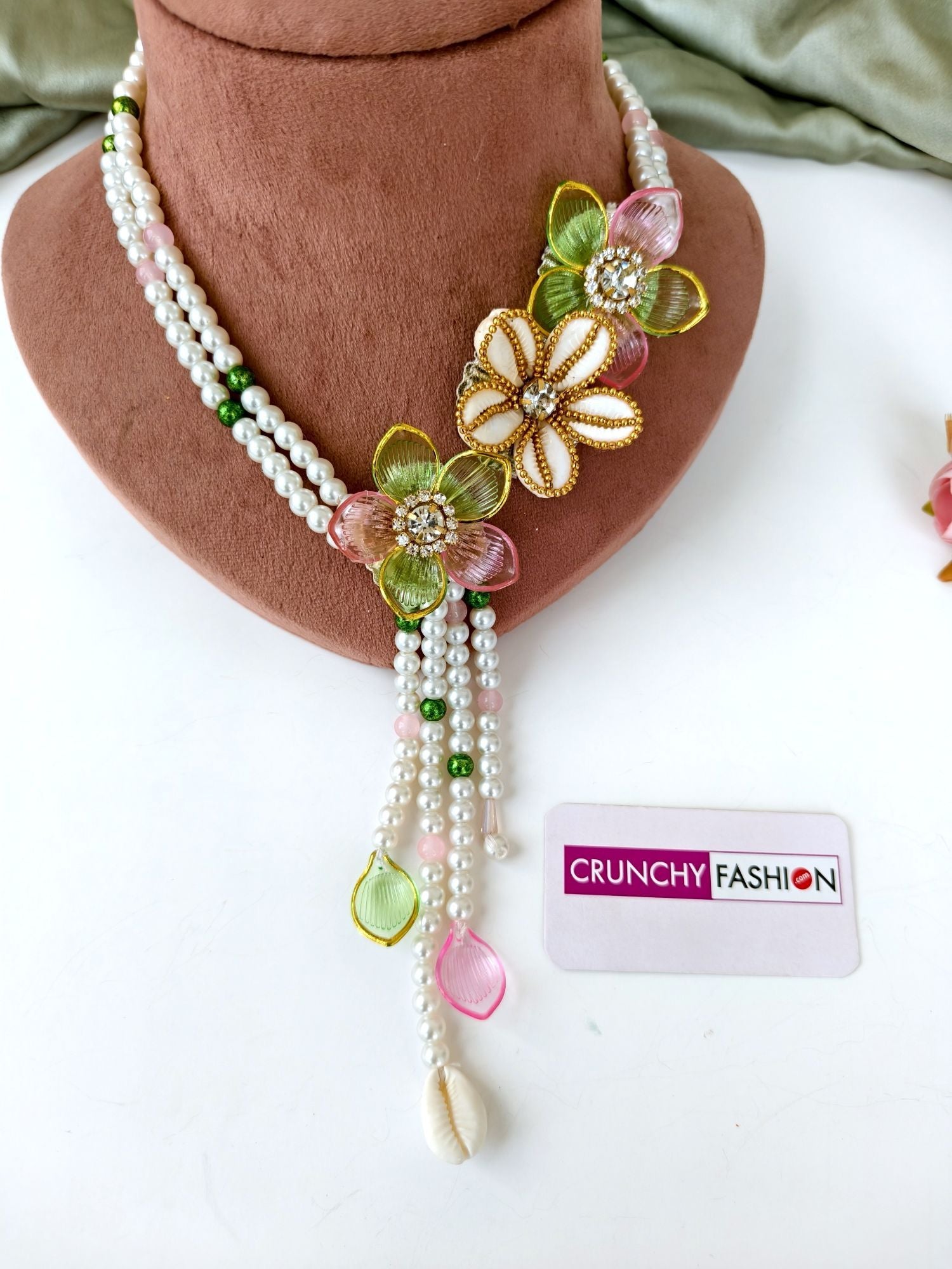 Green-pink floral sea shell bridal jewellery set for haldi mehndi