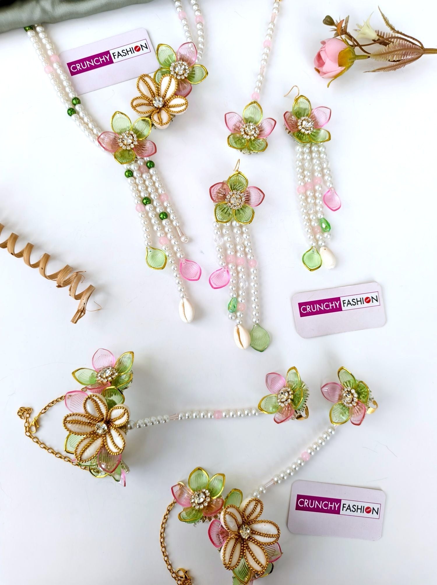 Green-pink floral sea shell bridal jewellery set for haldi mehndi
