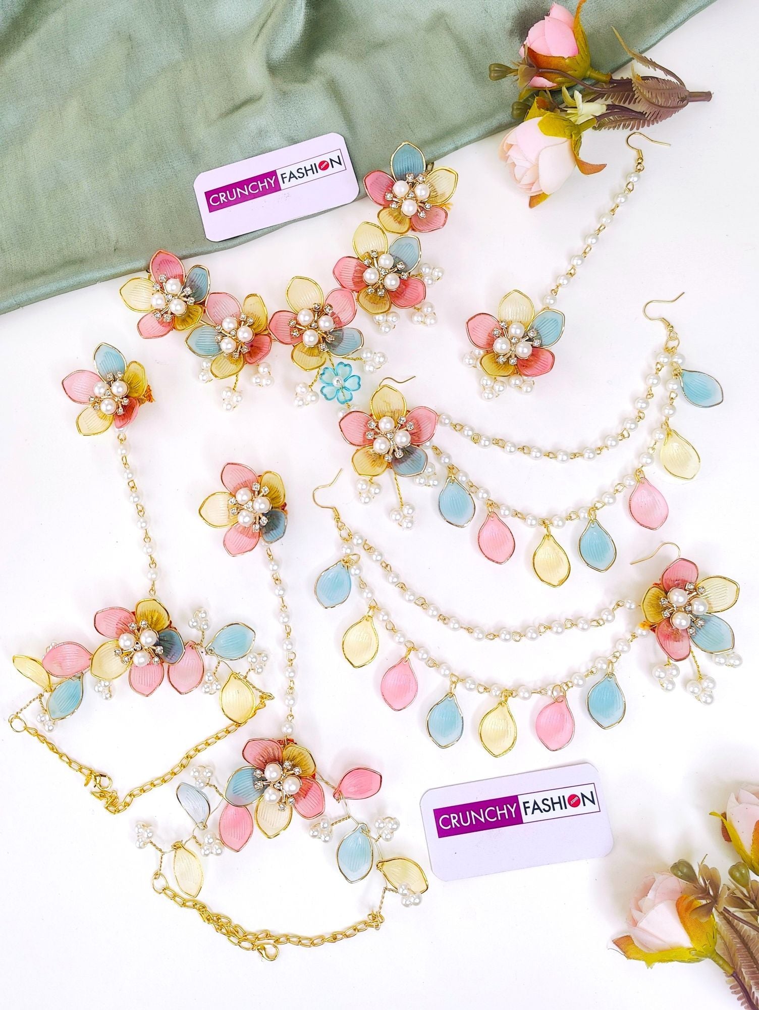 Multicolored handmade resin carnival floral jewellery set with gold plating, ideal for brides at haldi-mehndi ceremonies