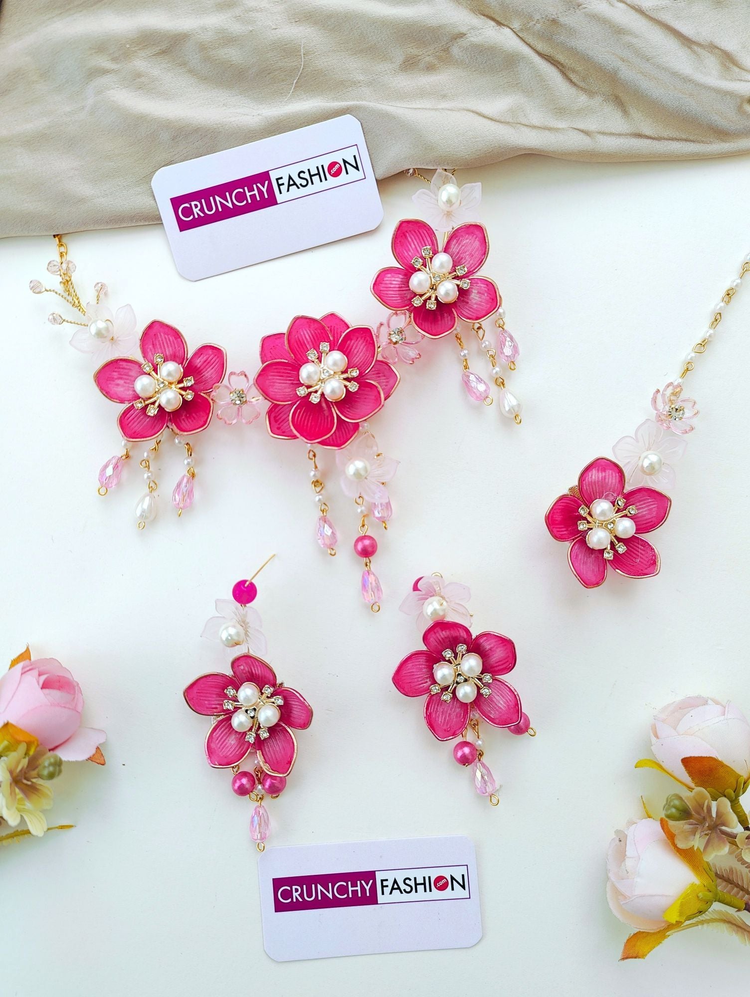 Handmade pink floral bridal jewellery set, ideal for haldi and mehndi ceremonies, featuring acrylic flowers and gold plating