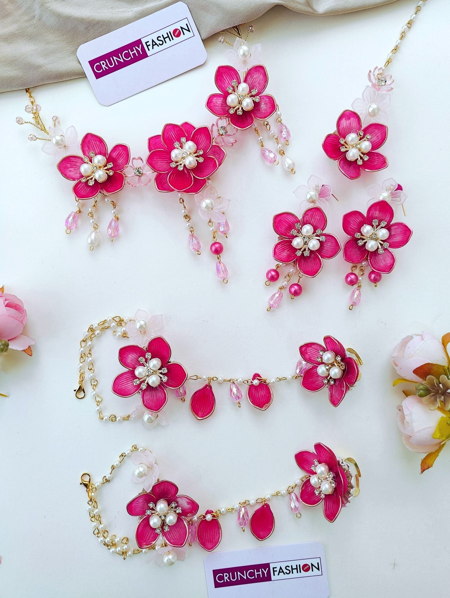 Handmade pink floral bridal jewellery set, ideal for haldi and mehndi ceremonies, featuring acrylic flowers and gold plating