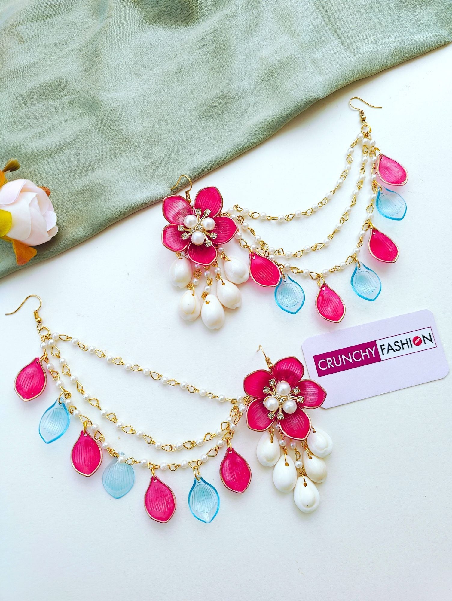 Sky-blue and pink floral resin jewellery set with gold plating, ideal for haldi or mehndi ceremonies for brides