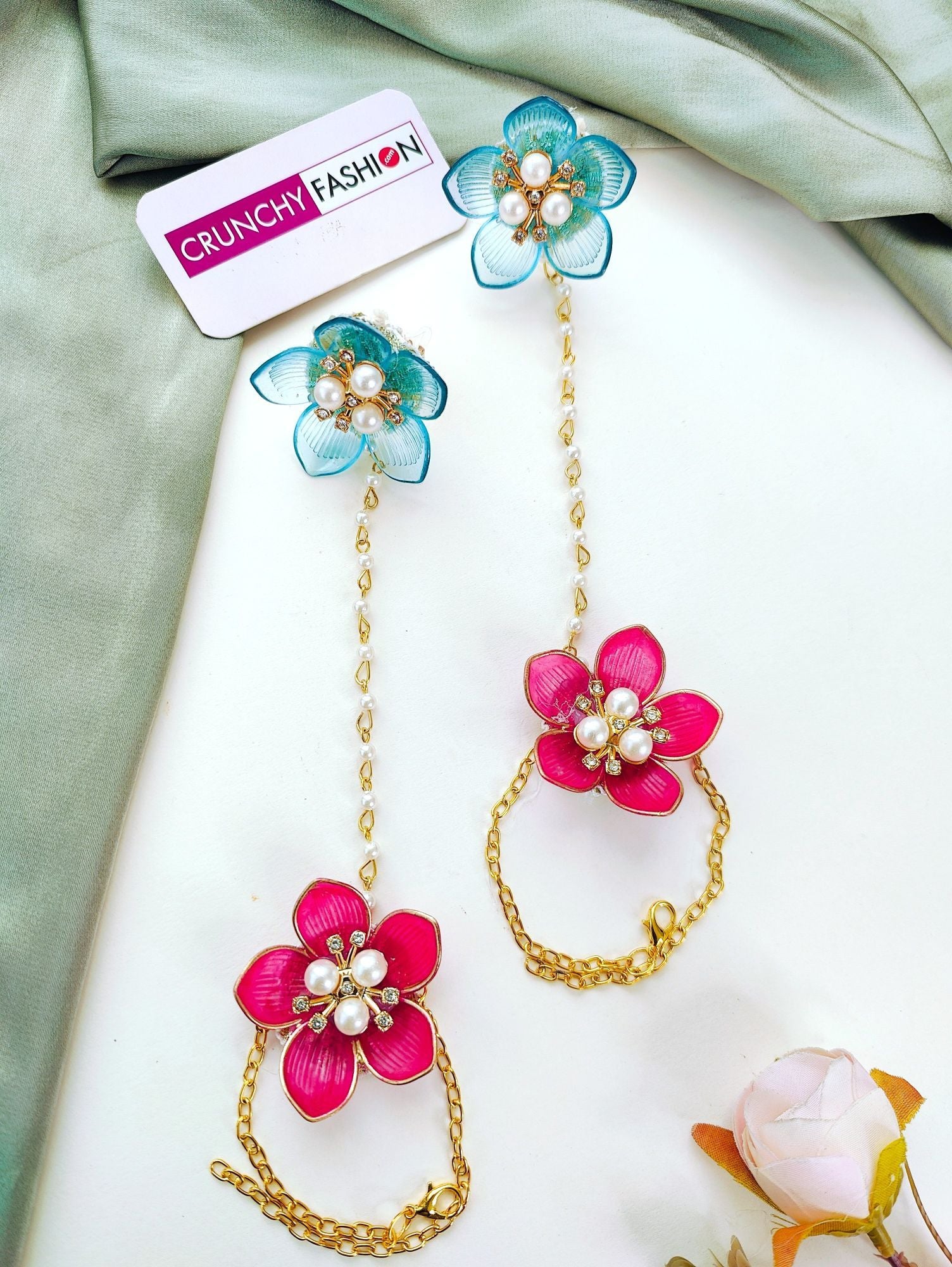 Sky-blue and pink floral resin jewellery set with gold plating, ideal for haldi or mehndi ceremonies for brides