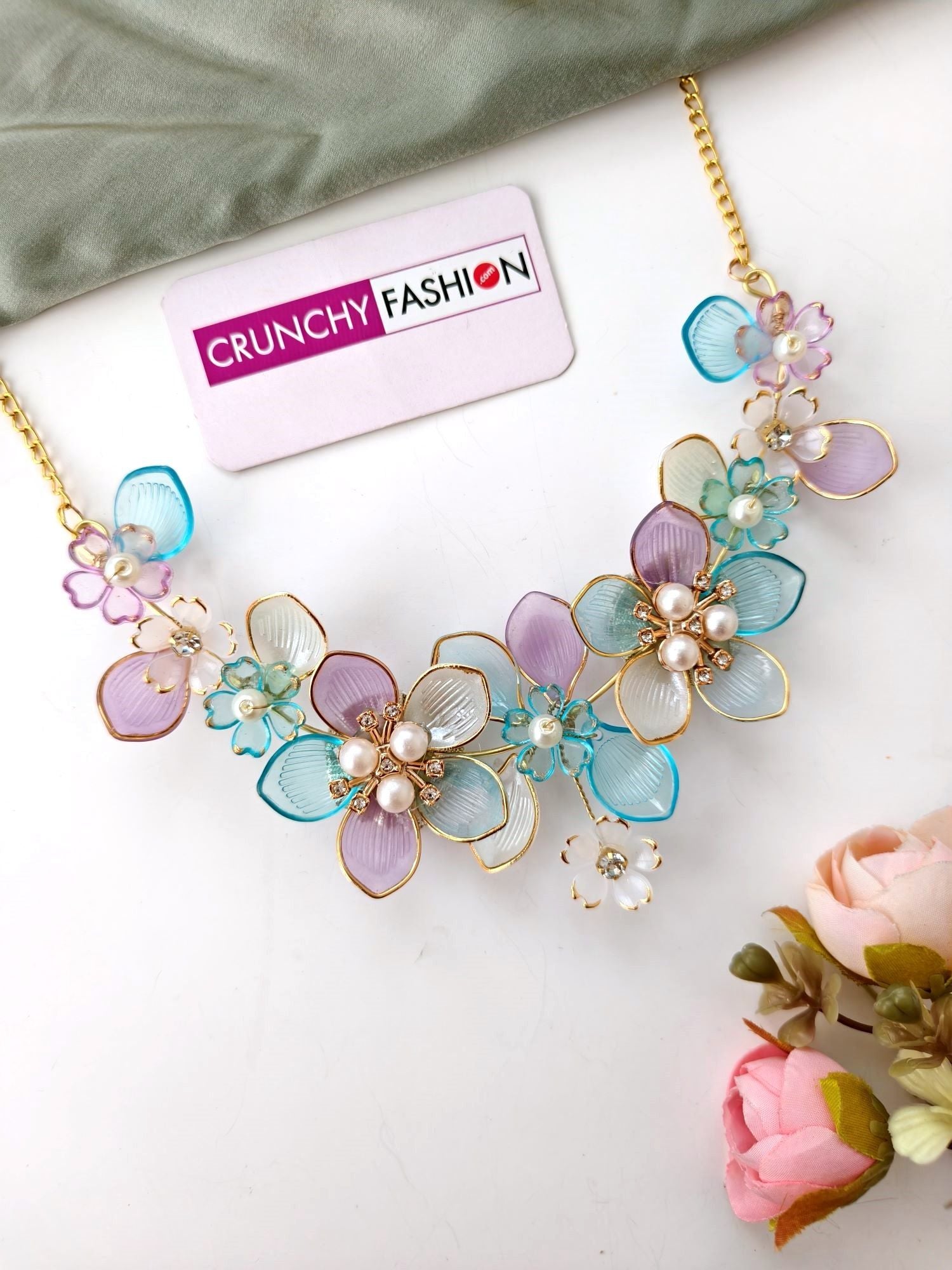 powder blue jewellery set with pink flower design for wedding