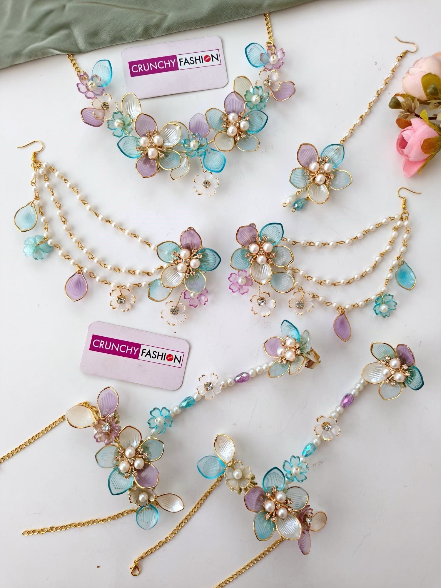 powder blue jewellery set with pink flower design for wedding