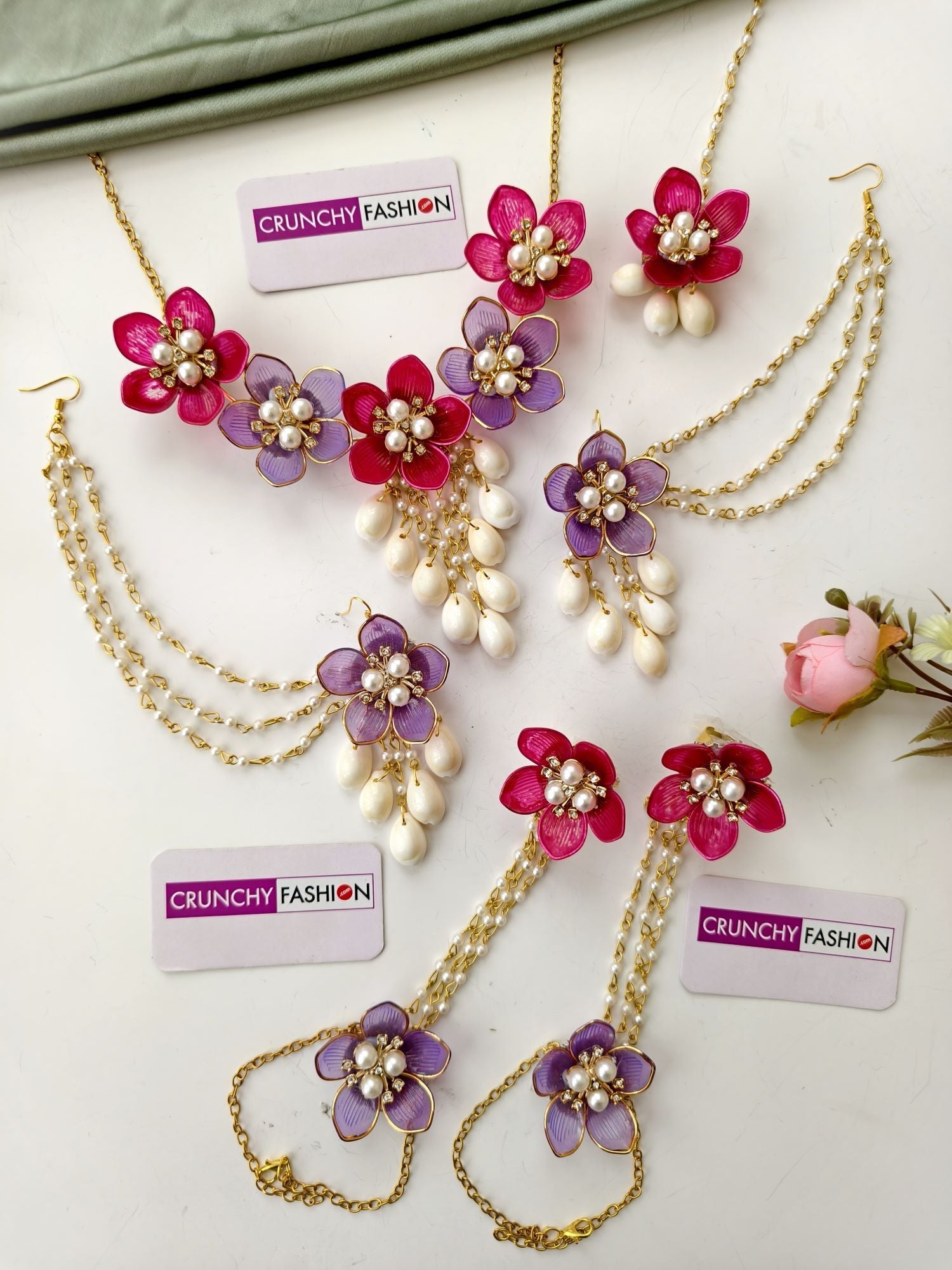 Pink-purple acrylic flower and shell jewelry set for women, ideal for haldi, mehndi, or wedding events