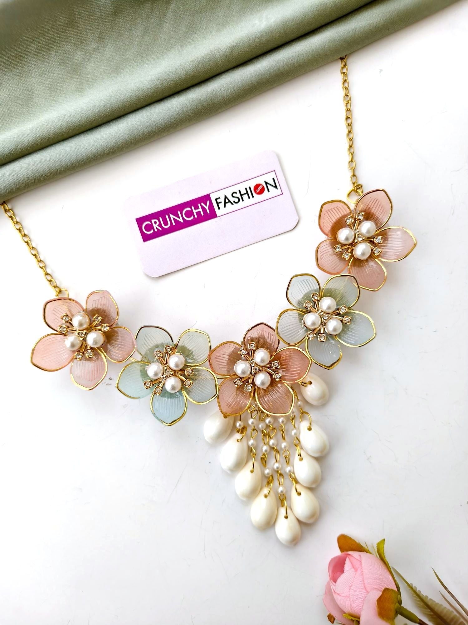 Pink-powder blue floral haldi jewellery set for bride with seashells, resin beaded, ideal for wedding or mehndi