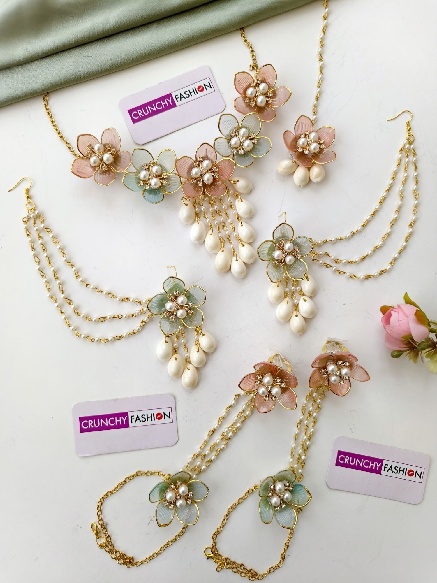 Pink-powder blue floral haldi jewellery set for bride with seashells, resin beaded, ideal for wedding or mehndi