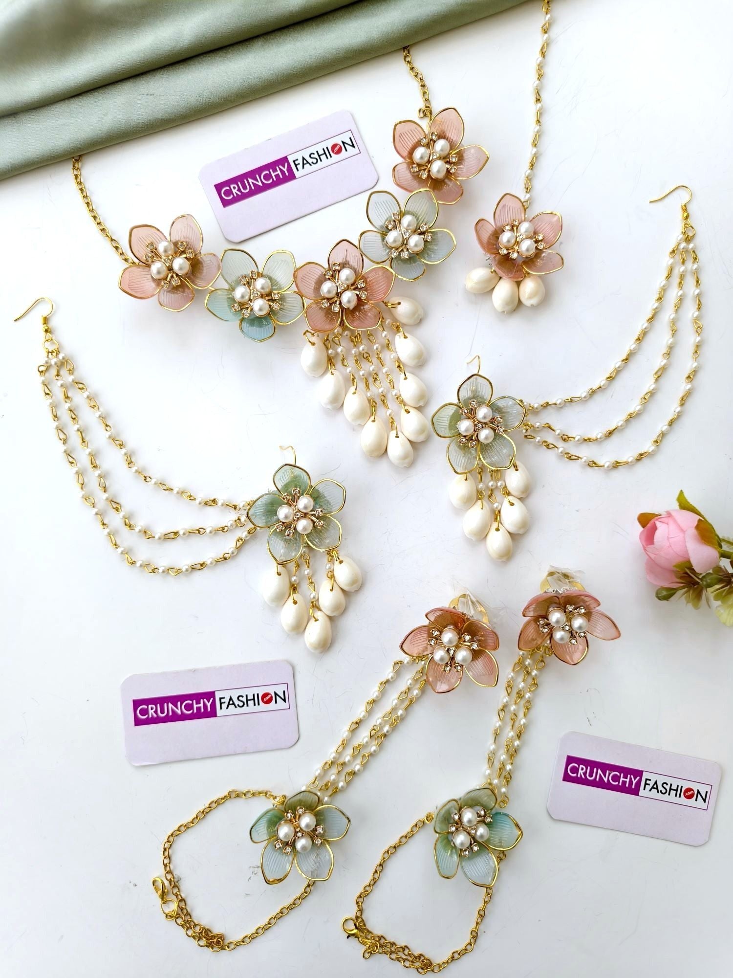 Pink-powder blue floral haldi jewellery set for bride with seashells, resin beaded, ideal for wedding or mehndi