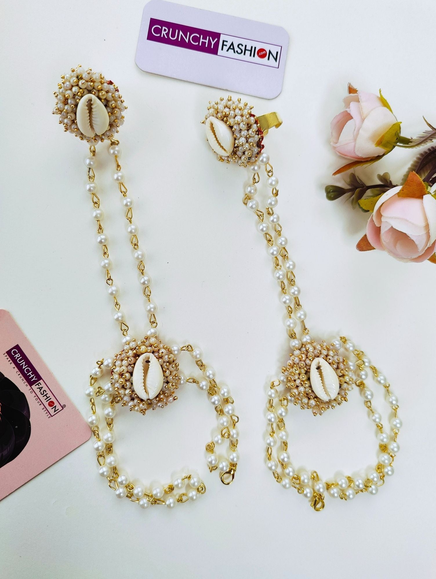 Off-white Haldi Mehndi jewellery, handcrafted sea shell Hathphool set with flower design and gold plating