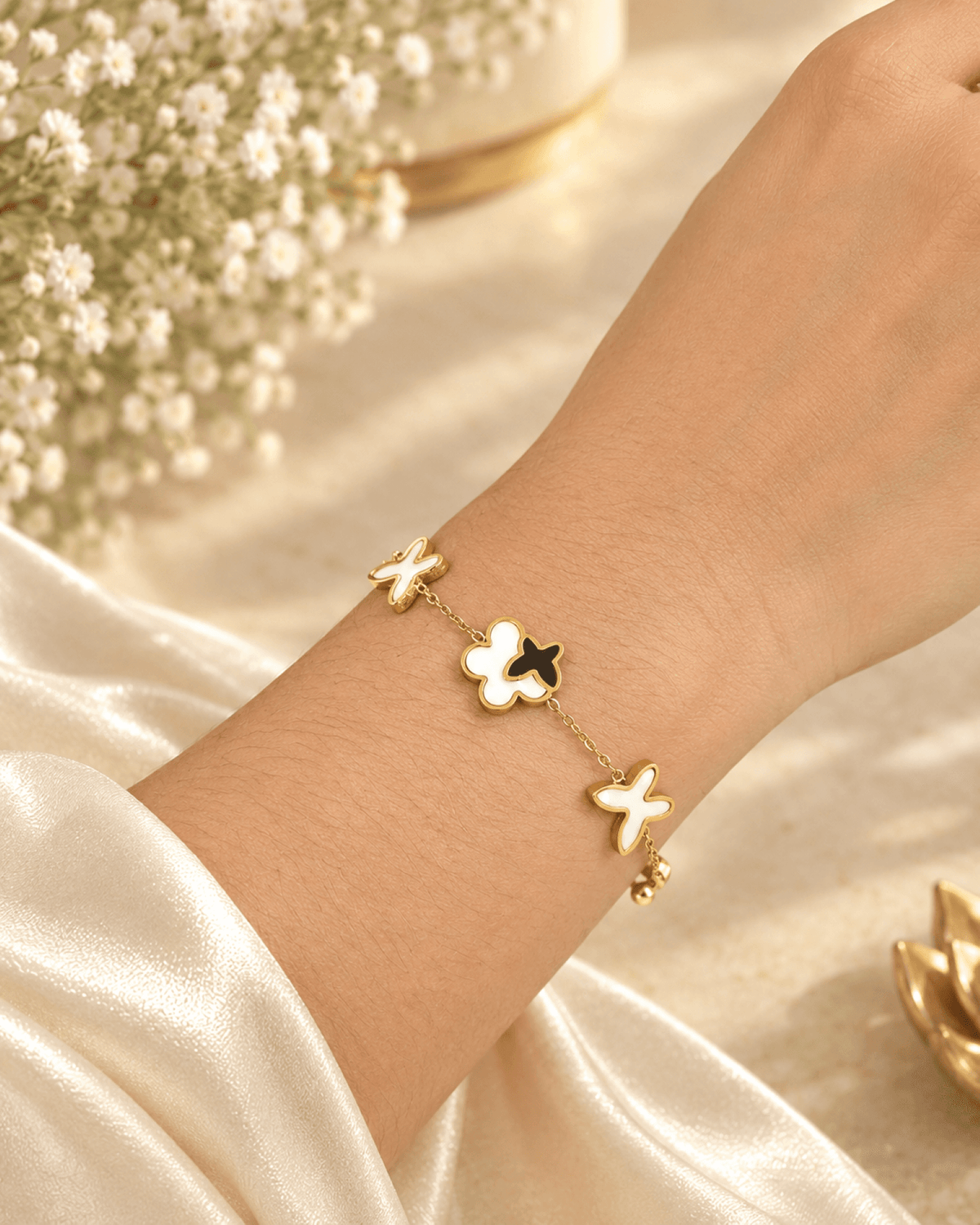 anti tarnish butterfly bracelet for women with white flower charms