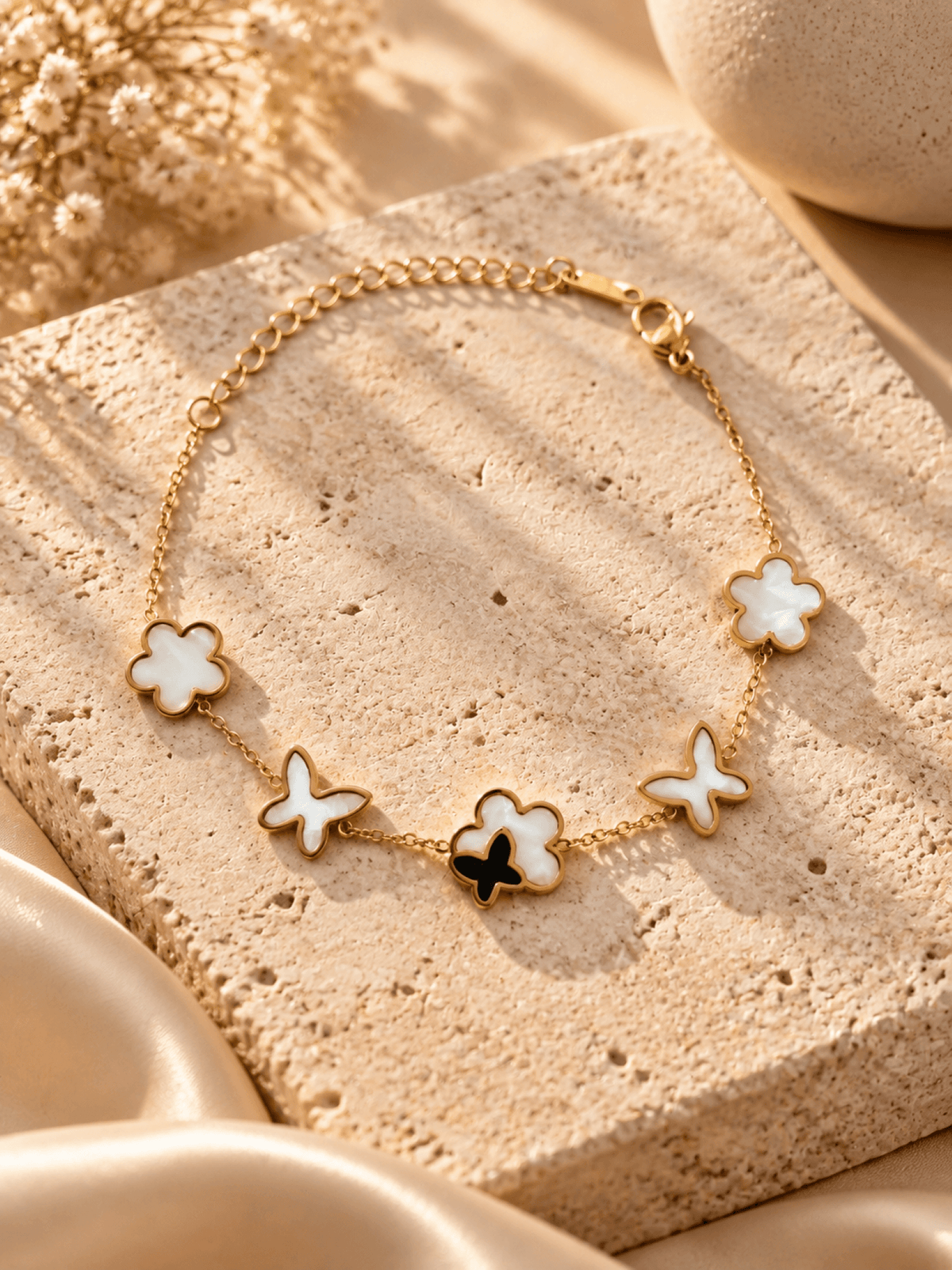 anti tarnish butterfly bracelet for women with white flower charms