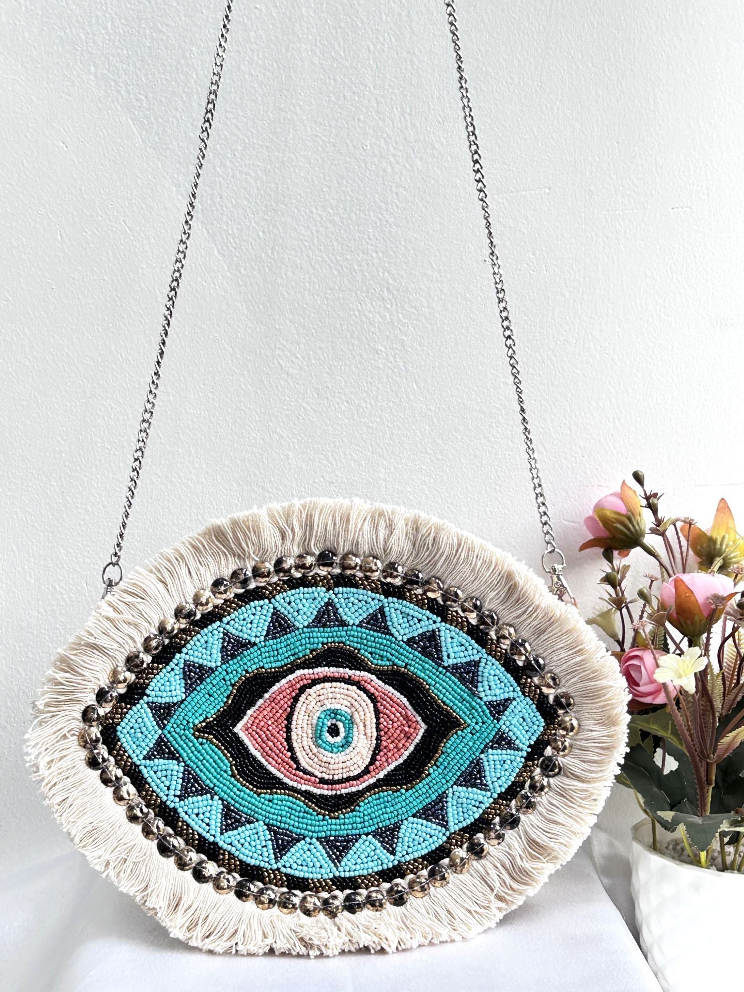 New multicolored beaded handbag ideal for everyday usage designed for women, a popular choice amongst ladies handbags brands.