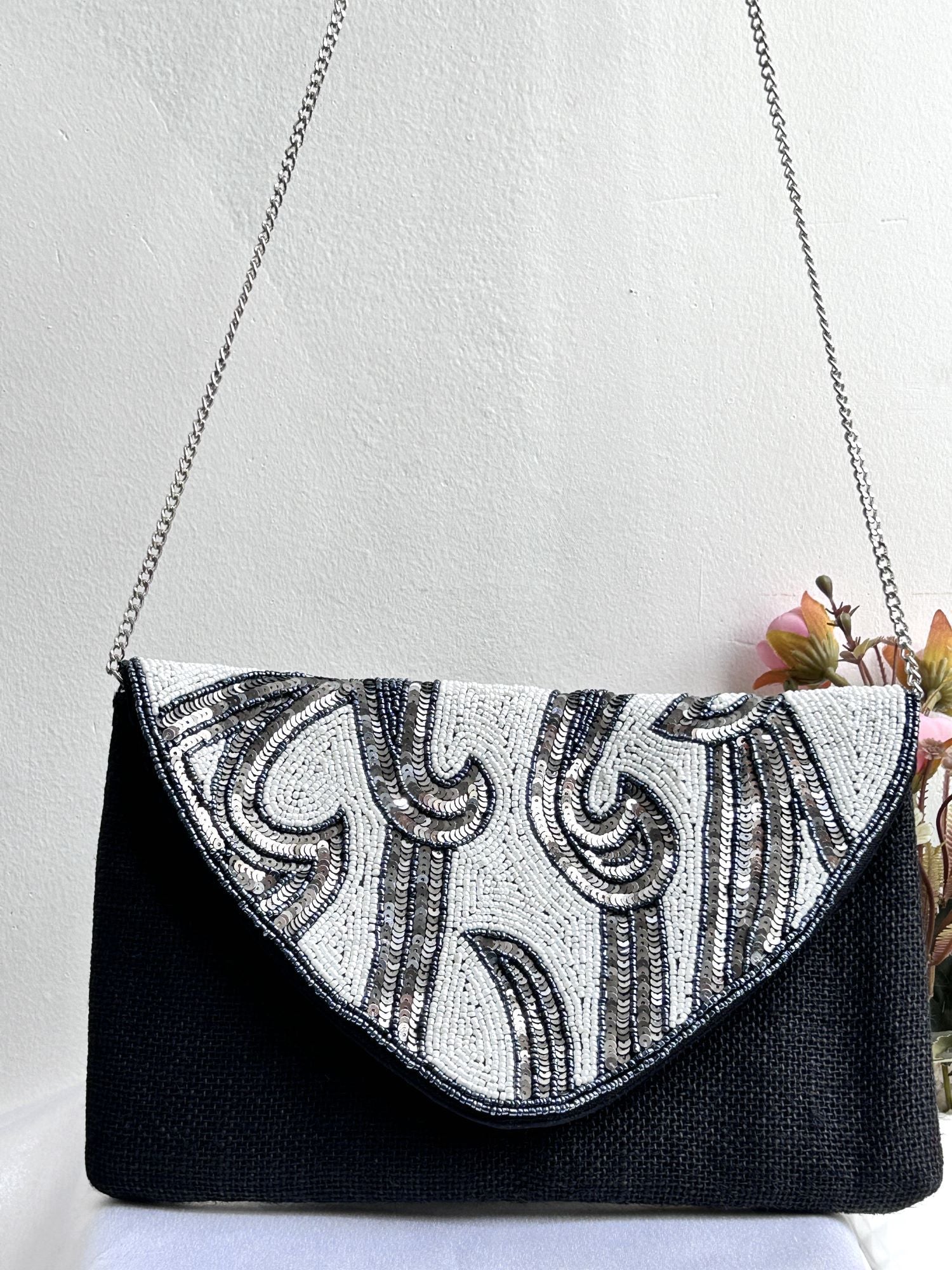 New multicolor beaded bag for women, ideal for everyday use. Unique design featuring an intricate pattern of beads.