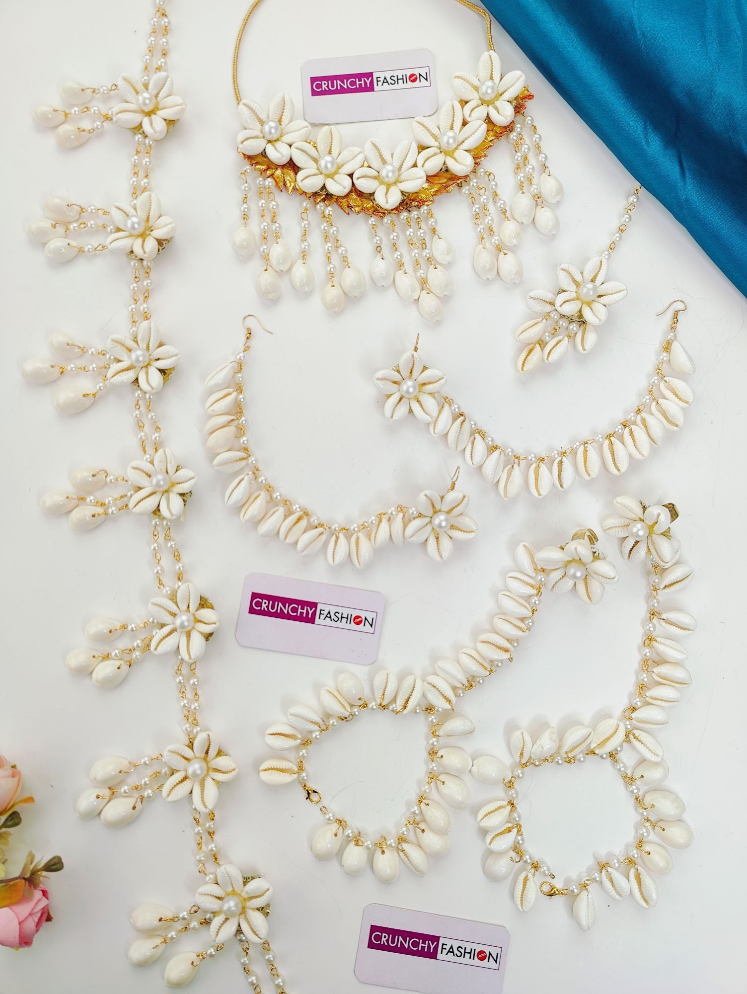 Elegant white flower-themed baby shower jewellery set with necklace, earrings and Maang Tikka for women.