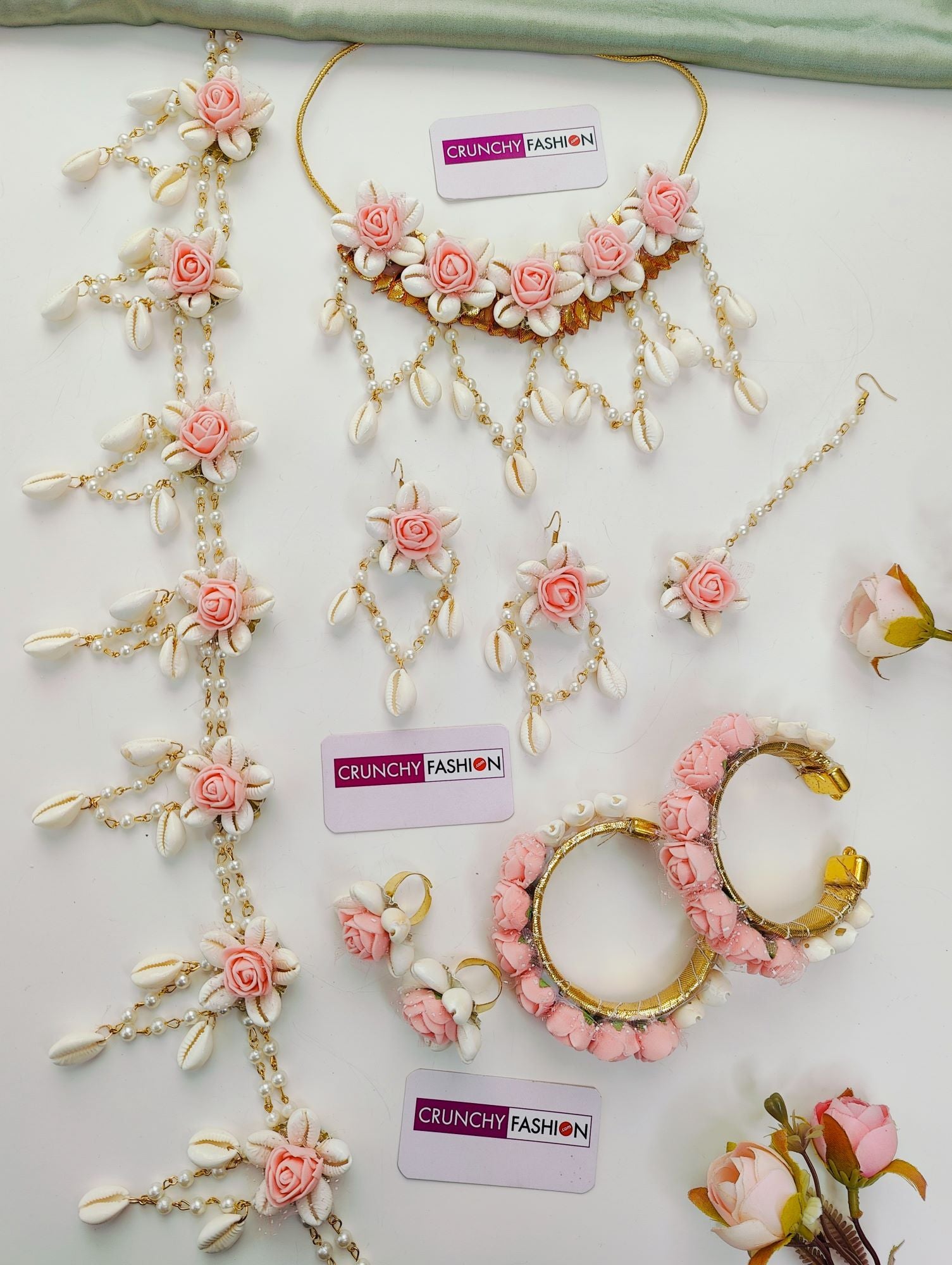 Pink baby shower floral jewellery set for women including necklace, earrings, Maang Tikka, Hathphool, and earchains.