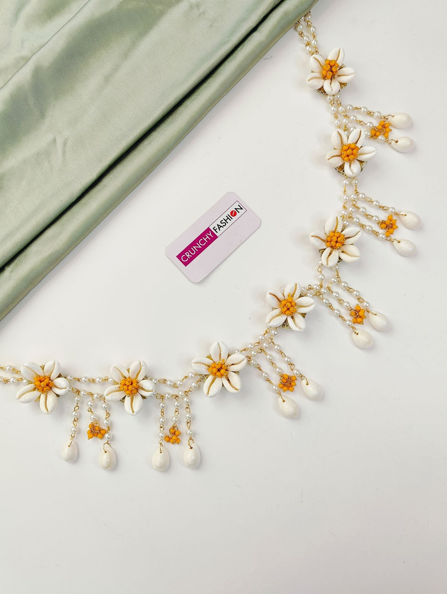 Yellow and white seep moti flower-themed baby shower jewellery set for women, including necklace, earrings, and more.