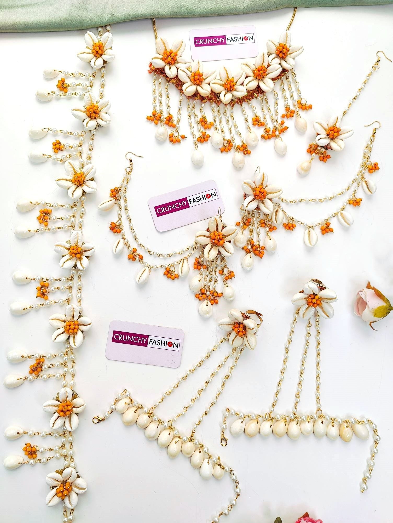 Yellow and white seep moti flower-themed baby shower jewellery set for women, including necklace, earrings, and more.