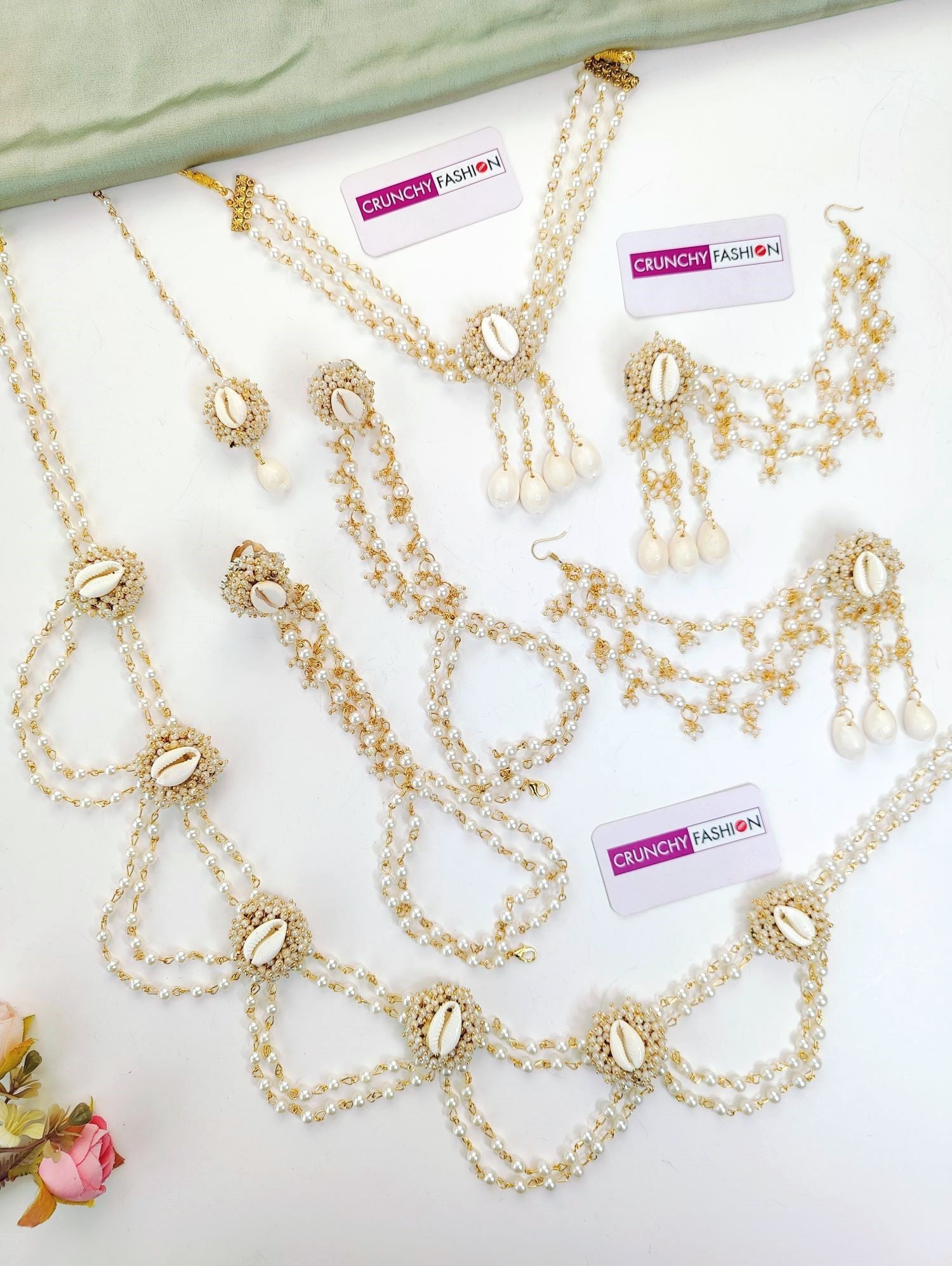 White ethnic seep moti flower baby shower jewellery set with necklace, earrings, and hathphool