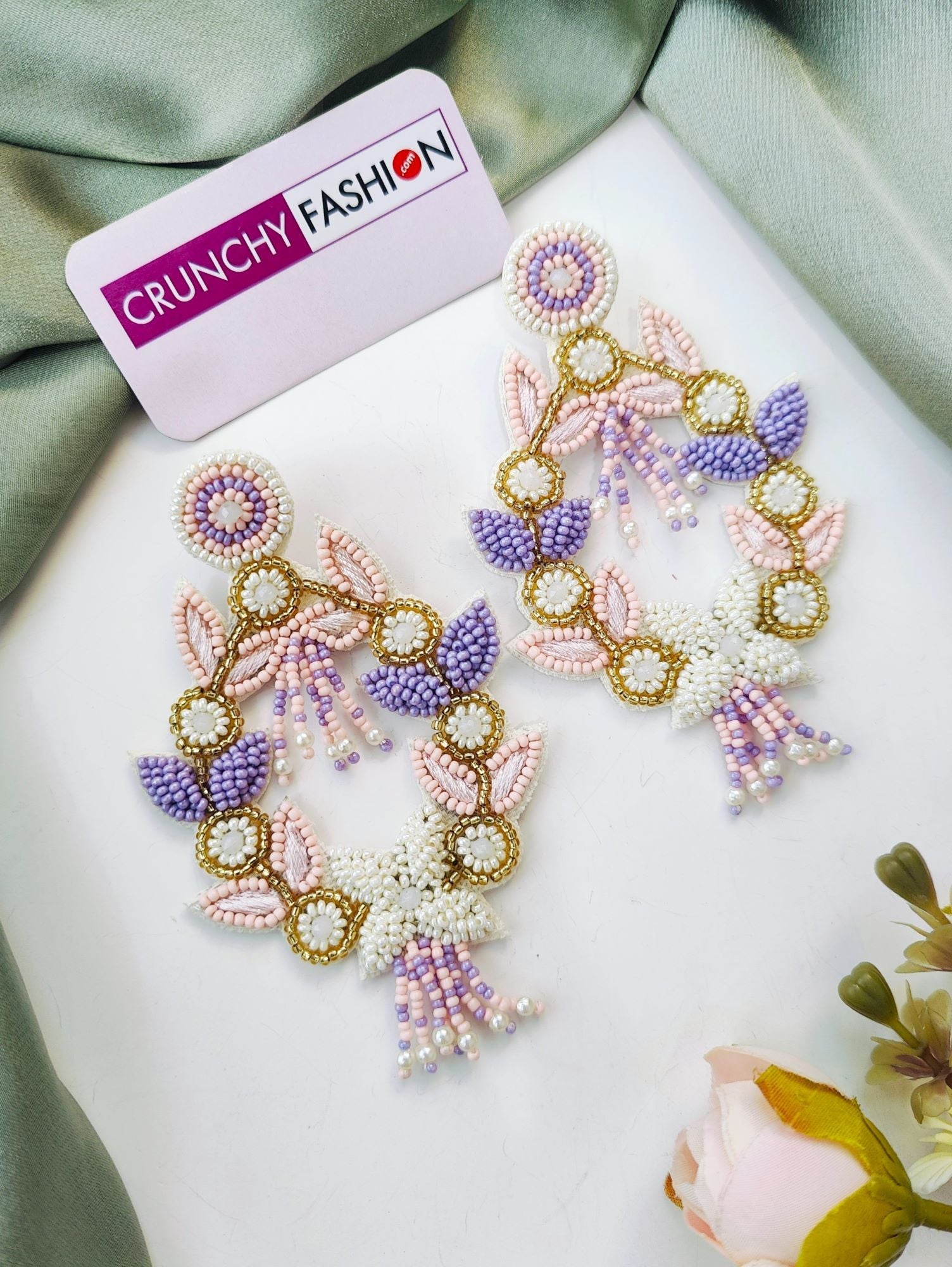 Lavender and pink handmade beaded flower-shaped earrings, ideal for women and girls on festive occasions like Haldi mehndi