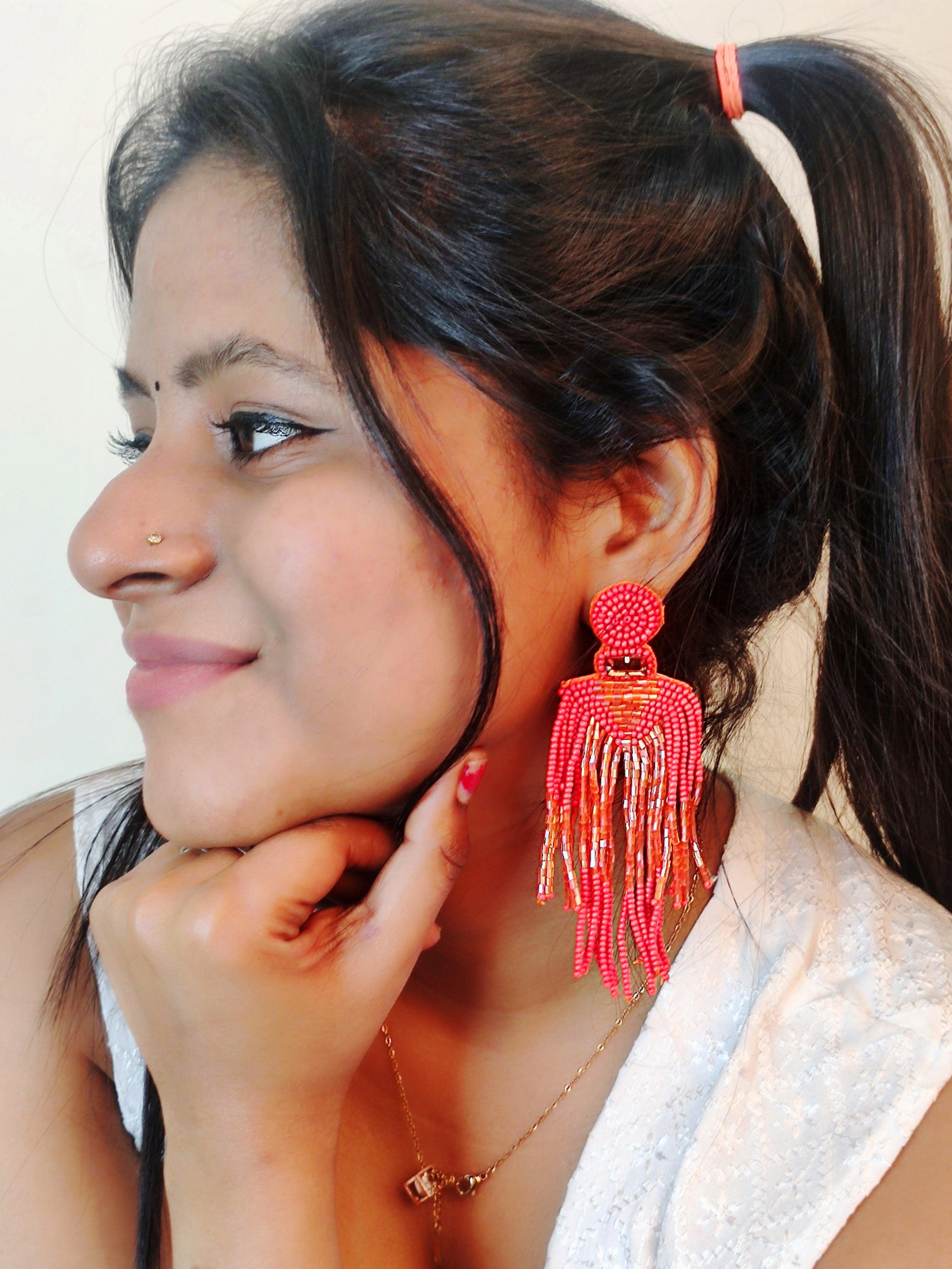 Chic Carnival: Orange Handmade Tassel Earrings for Quirky Fashionistas