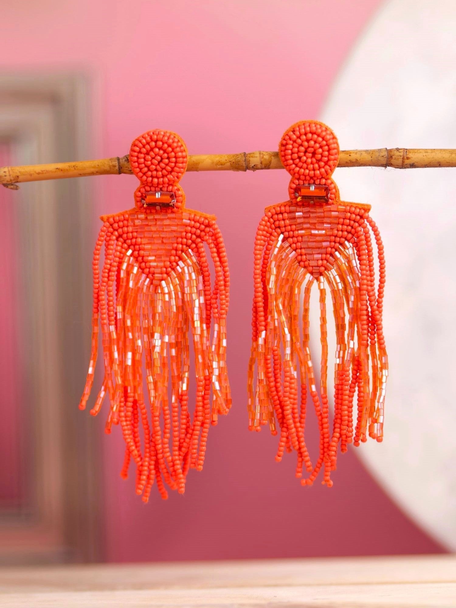 Chic Carnival: Orange Handmade Tassel Earrings for Quirky Fashionistas