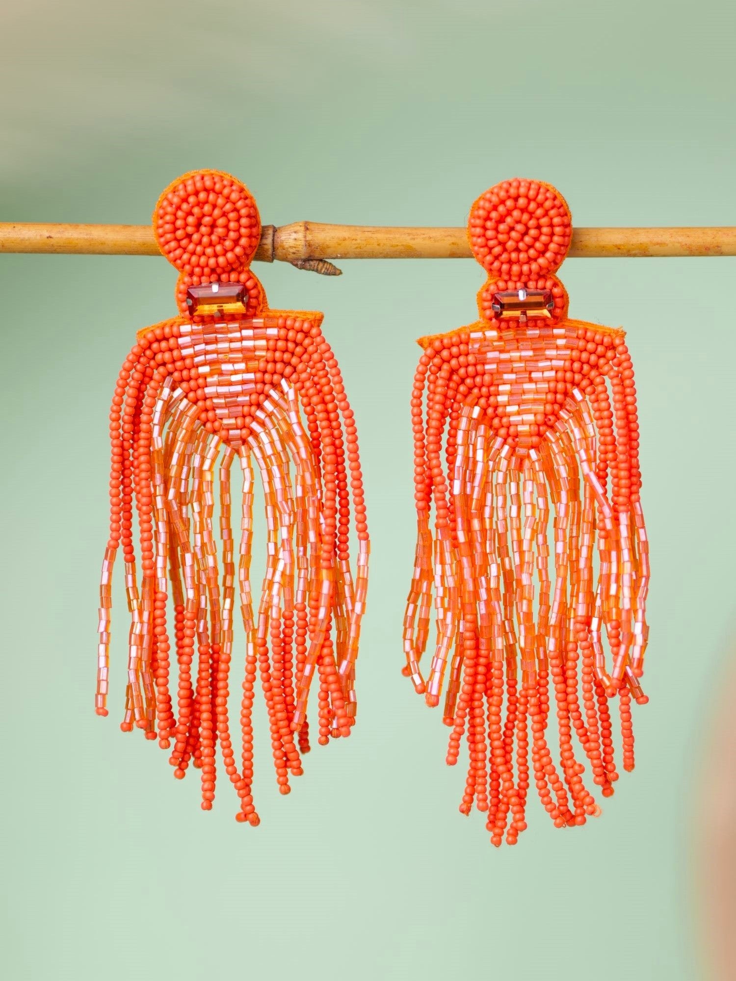 Chic Carnival: Orange Handmade Tassel Earrings for Quirky Fashionistas