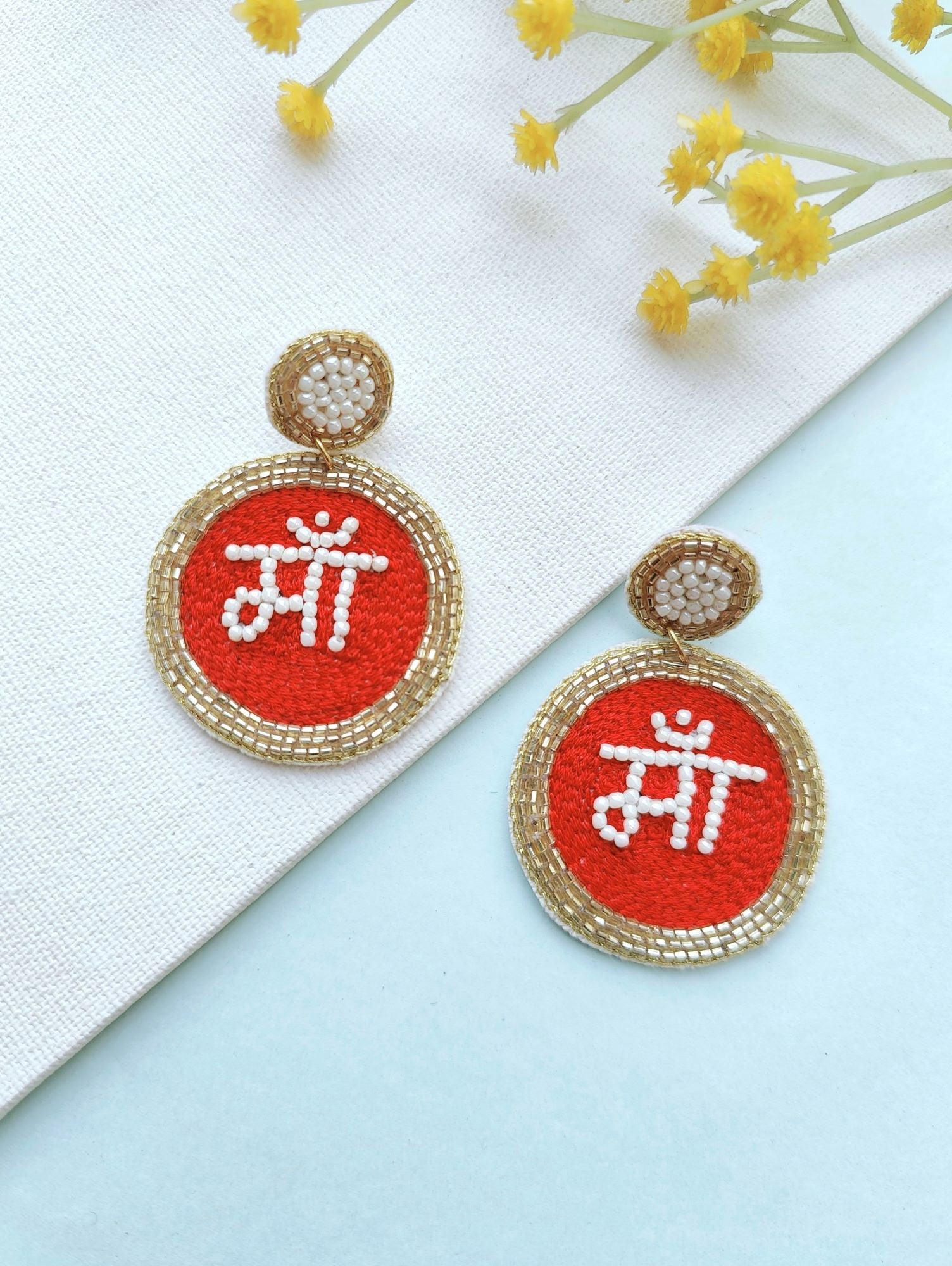 Handmade Maa earrings in red, ideal as gifts for women and girls suitable for everyday, date, or working day. Unique drop and dangler style, part of the handicraft collection.