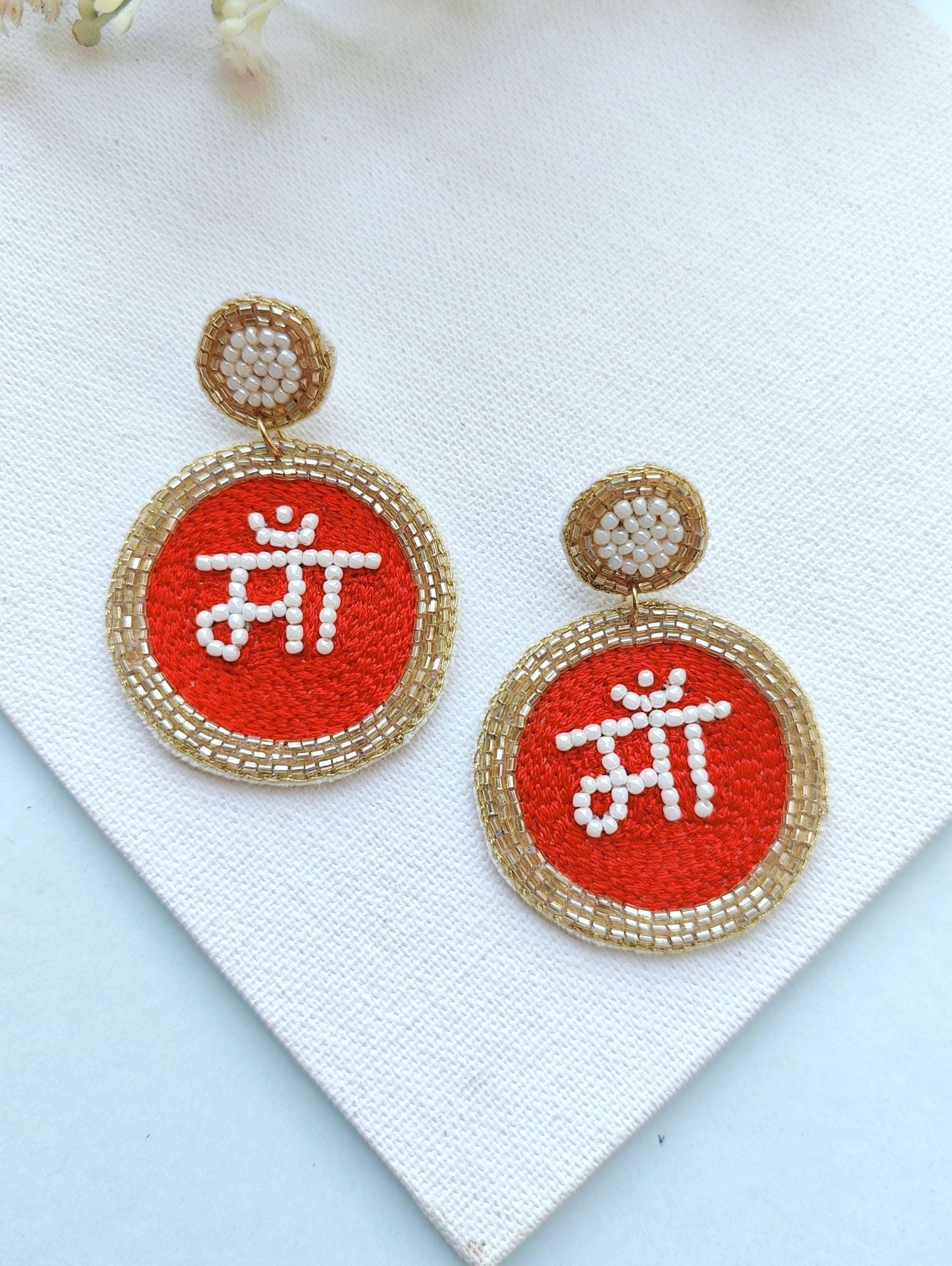 Handmade Maa earrings in red, ideal as gifts for women and girls suitable for everyday, date, or working day. Unique drop and dangler style, part of the handicraft collection.