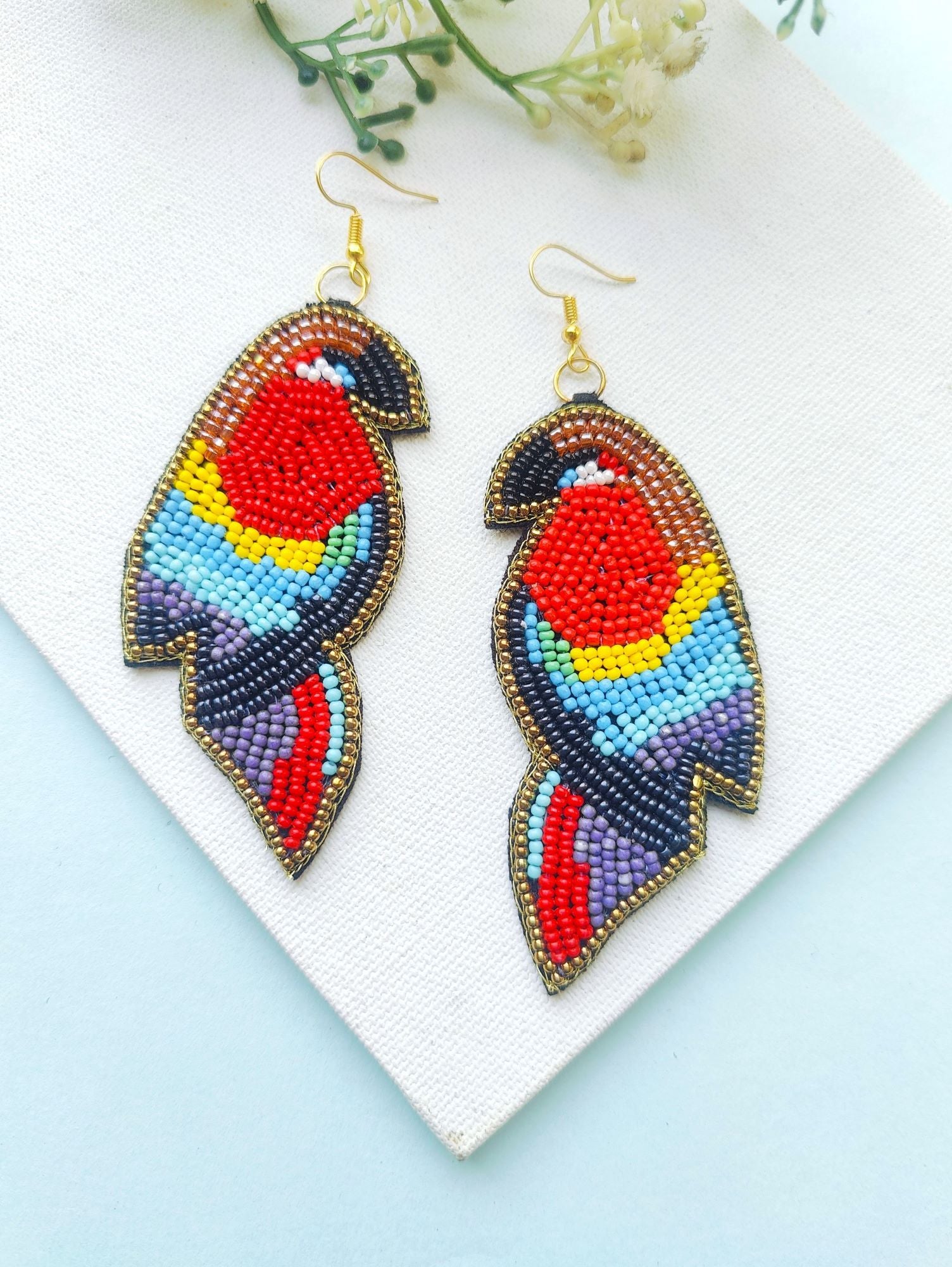 Handmade multicolored bird earrings in drop and dangler style, ideal for women and girls, perfect for festive and party occasions