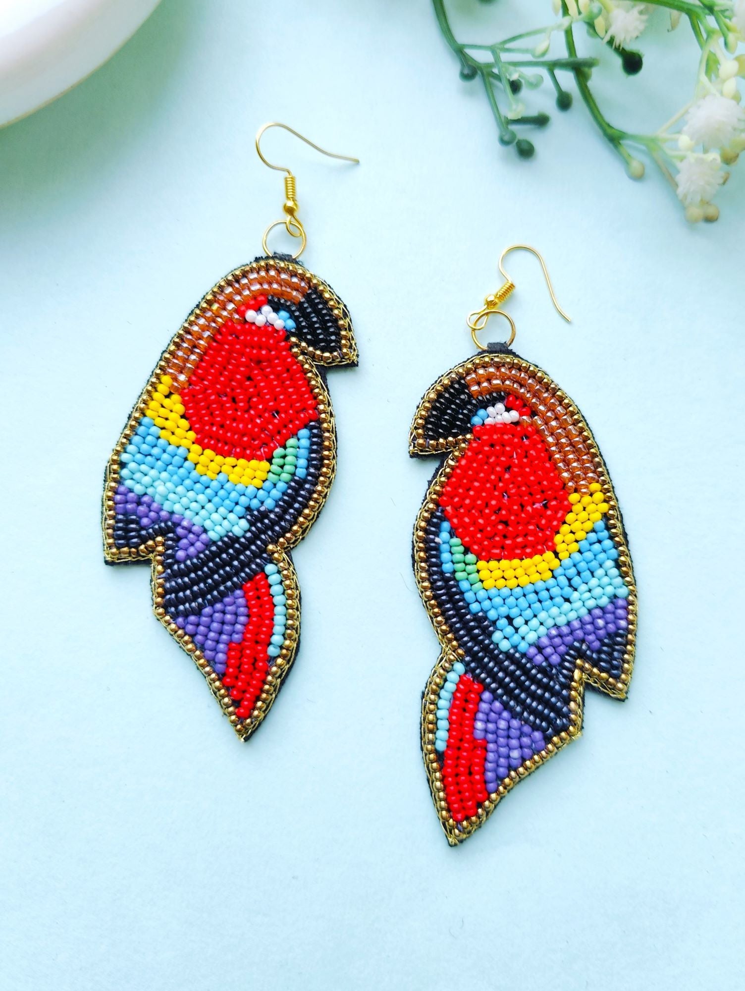 Handmade multicolored bird earrings in drop and dangler style, ideal for women and girls, perfect for festive and party occasions