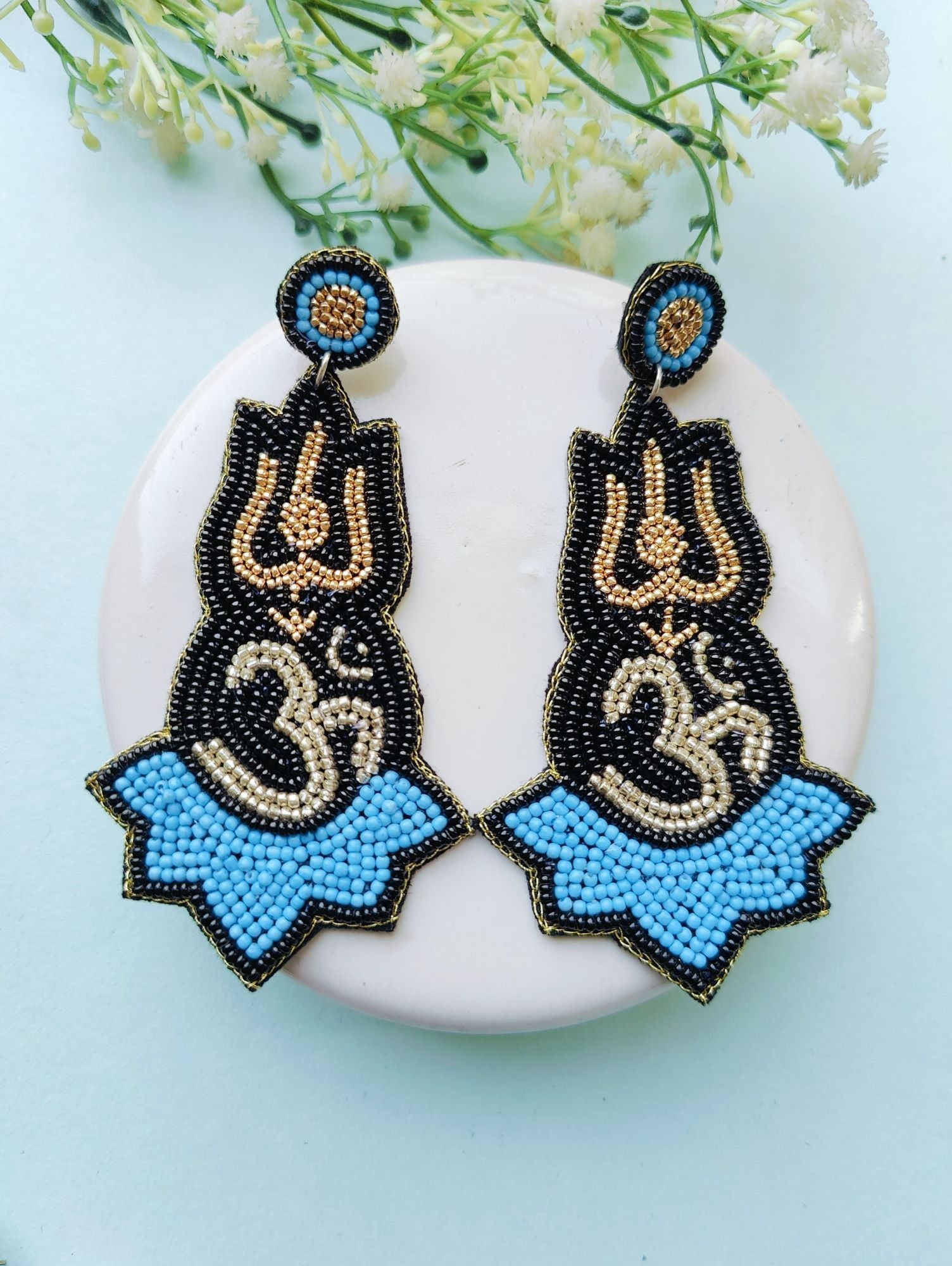 Blue beaded handmade Om Earrings in drop and dangler style, perfect for women and girls for daily use, festival, birthday or Valentine occasions.
