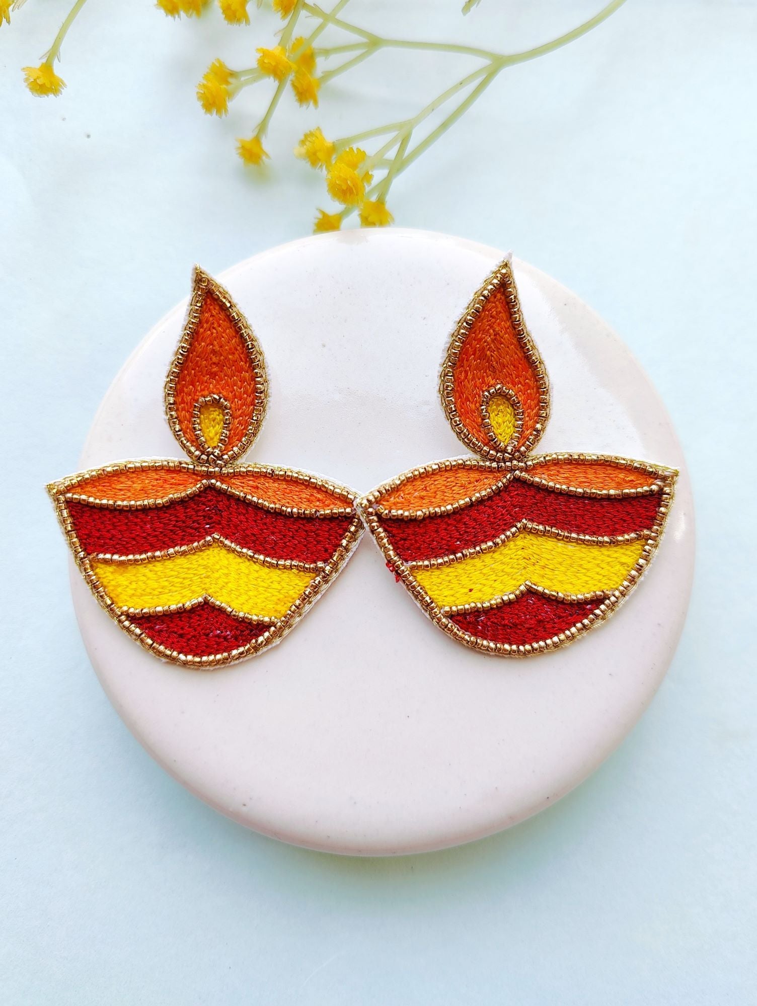 Orange beaded handmade earrings for women, ideal for daily use or festive occasions like Diwali, part of HANDICRAFT collection with push back piercing fixation.