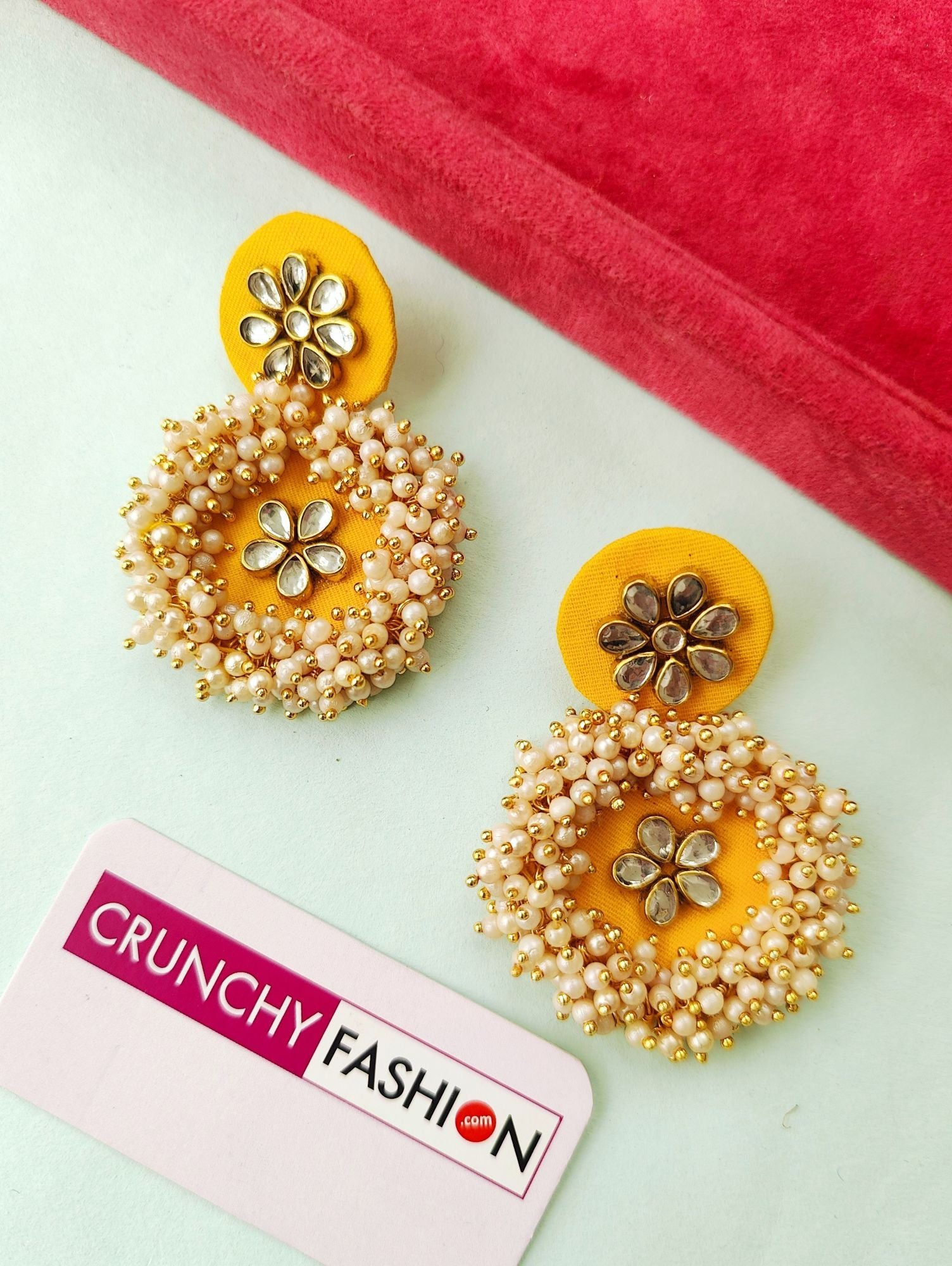 Handcrafted yellow fabric earrings with beaded floral design, ideal for haldi, mehandi, and parties