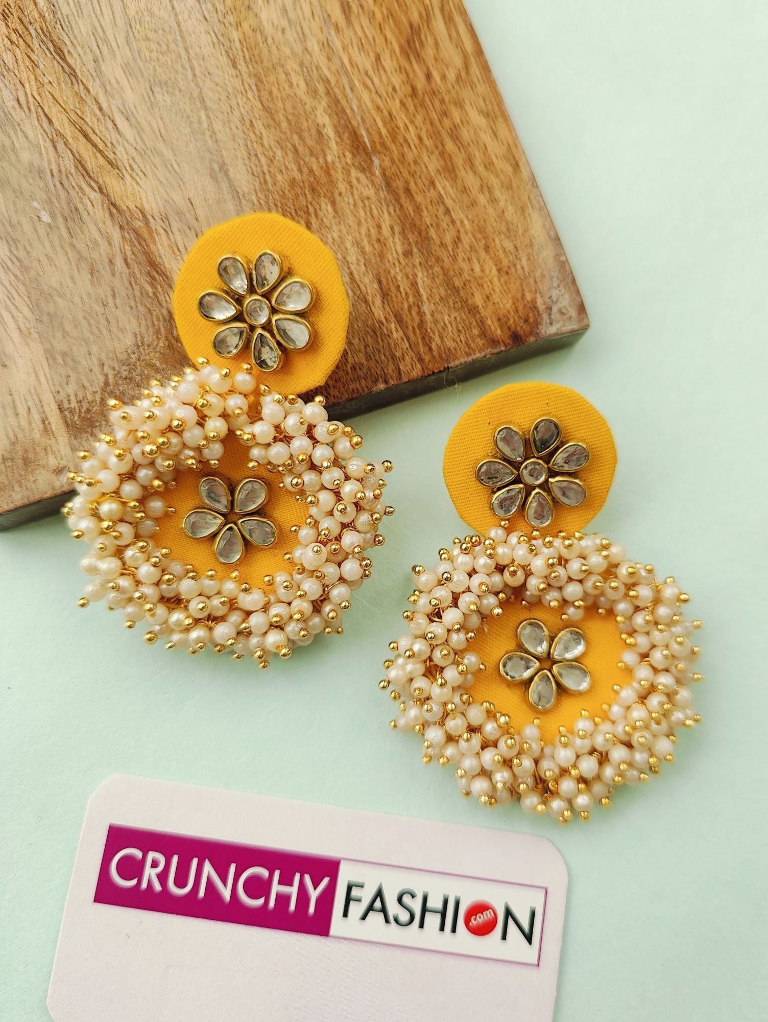 Handcrafted yellow fabric earrings with beaded floral design, ideal for haldi, mehandi, and parties