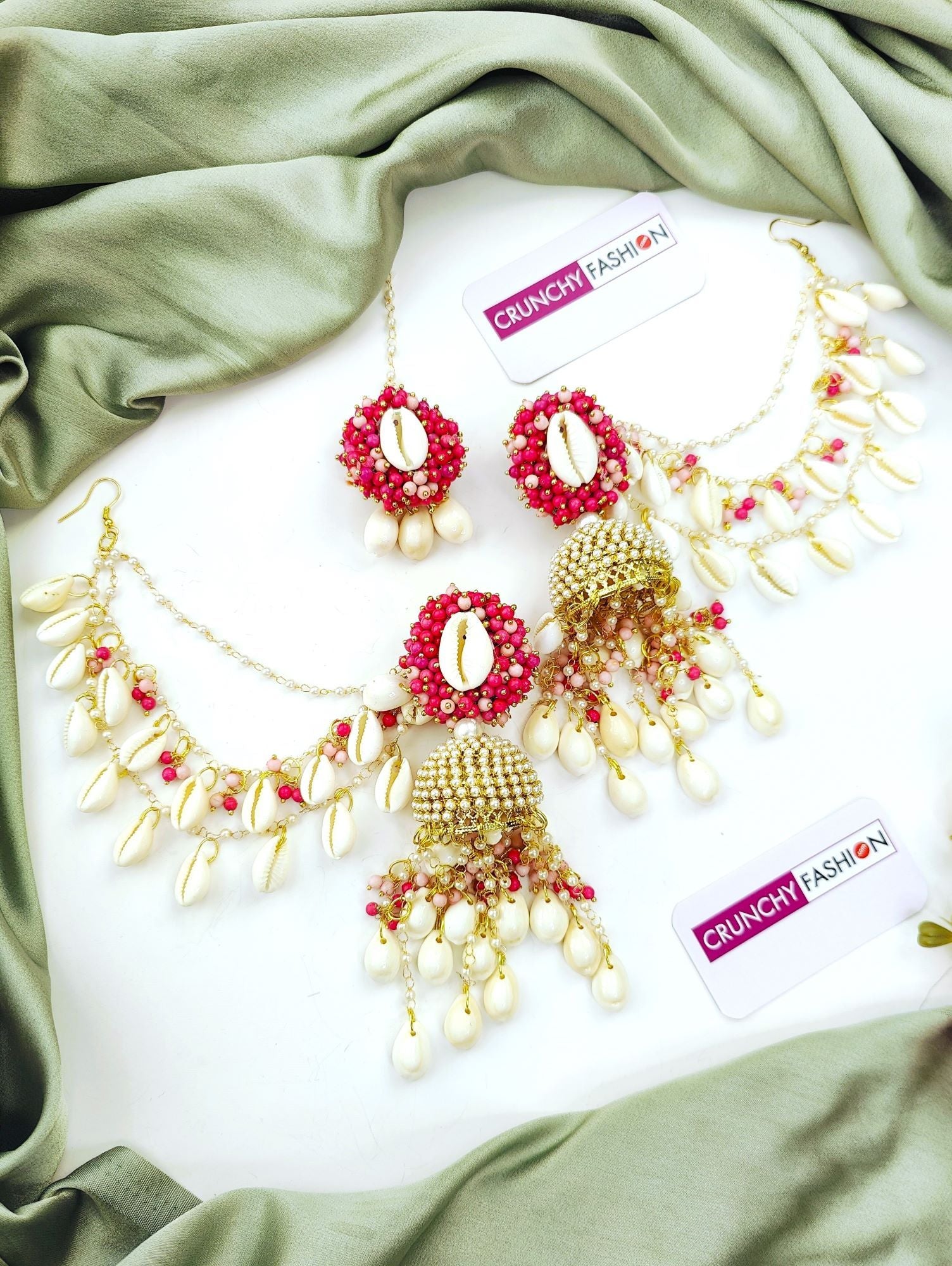 Women's floral-themed Pink Pearl & Sea Shell Jhumka Earrings & Tikka Set for Haldi occasion, handcrafted imitation jewelry