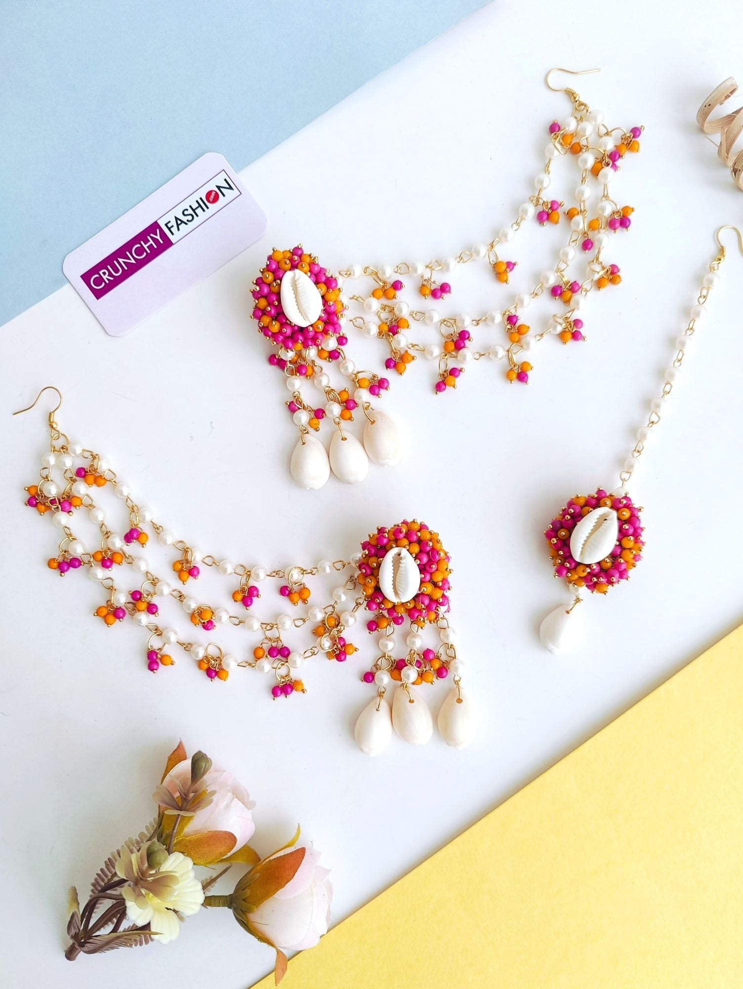 Women's floral-themed yellow Pearl & Sea Shell Earrings & Tikka Set for Haldi occasion, imitation jewelry