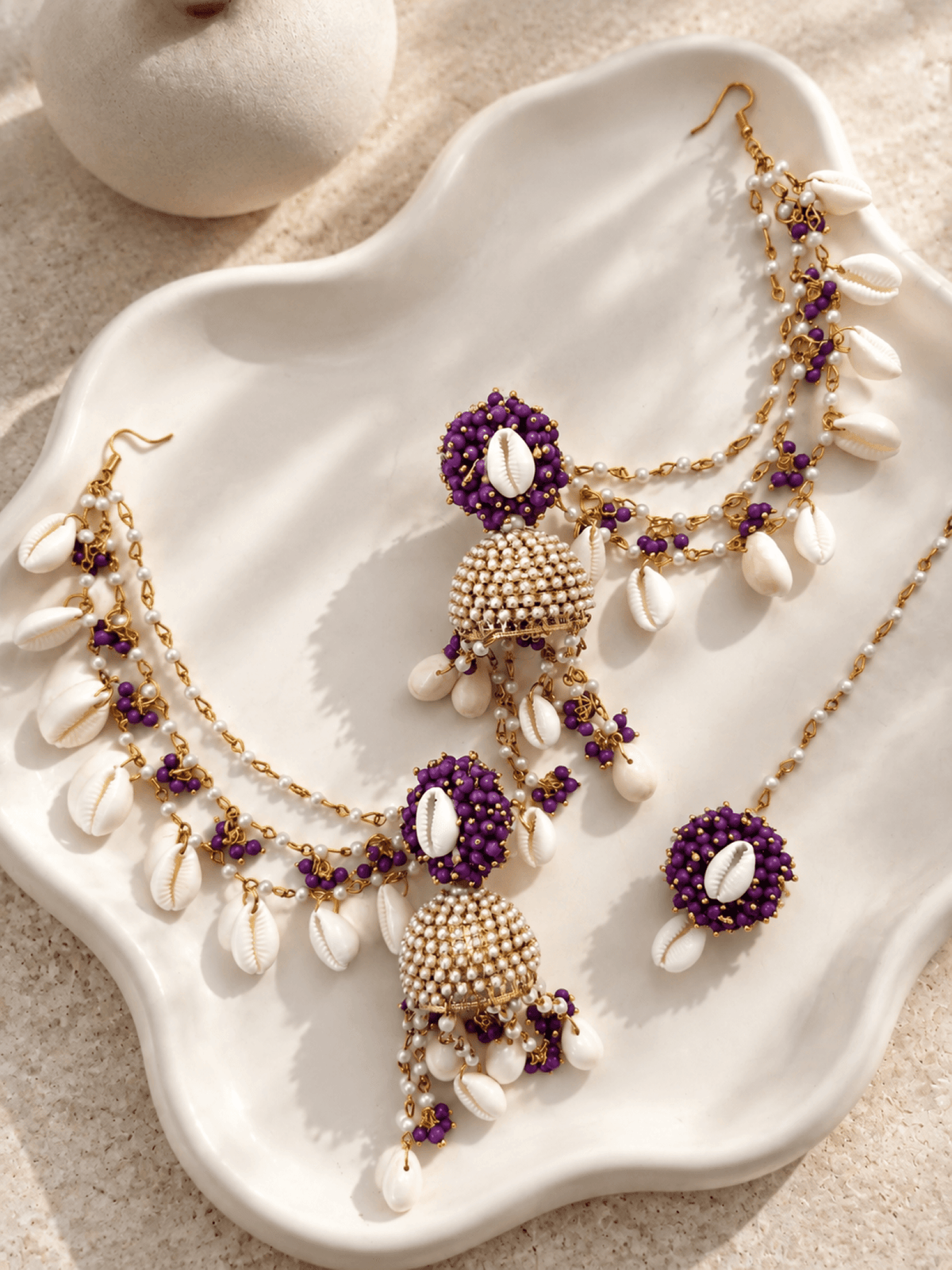 Purple pearl & sea shell jhumka earrings and tikka set for haldi