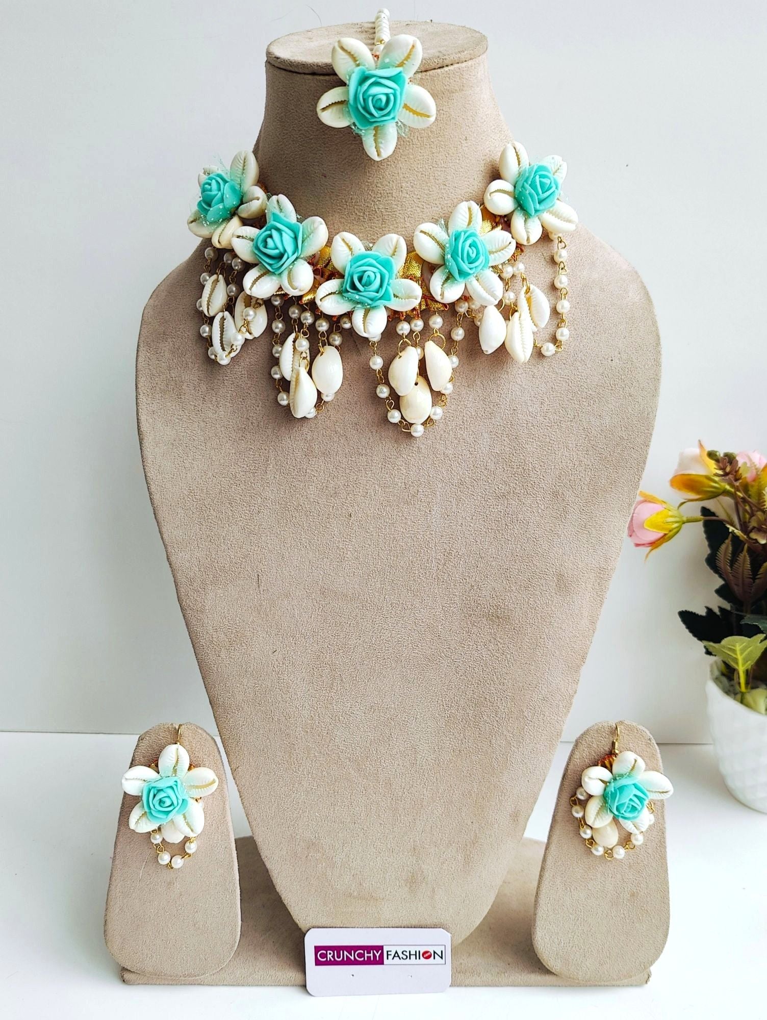 Floral green Haldi jewelry set handmade from sea shells, perfect for brides, wedding events, and Haldi ceremonies.
