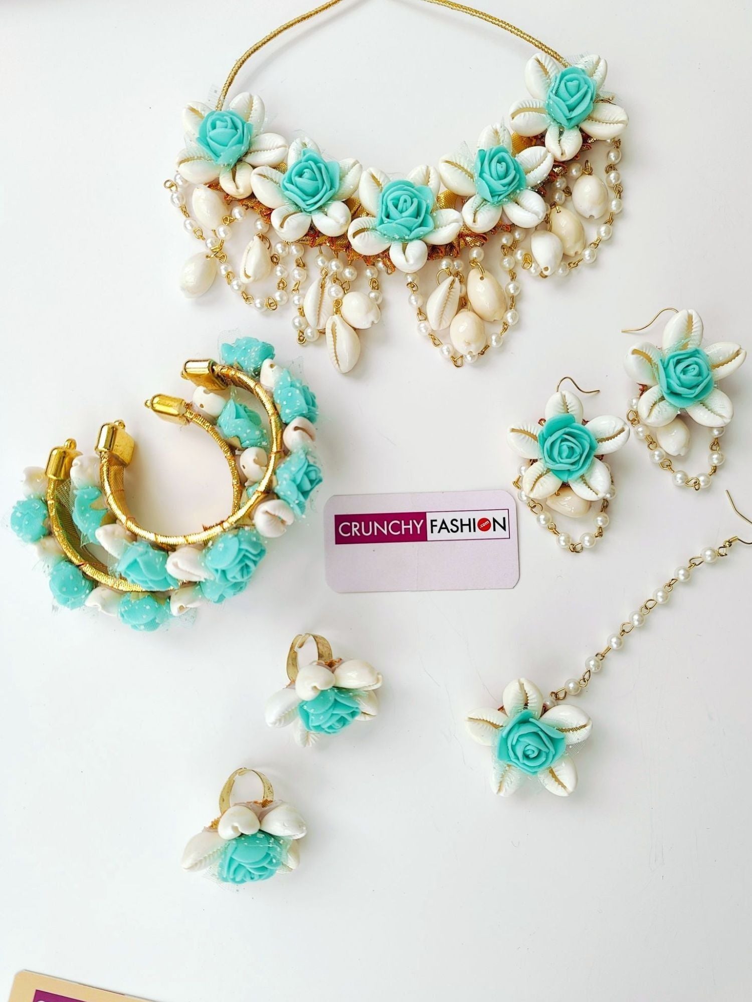 Floral green Haldi jewelry set handmade from sea shells, perfect for brides, wedding events, and Haldi ceremonies.