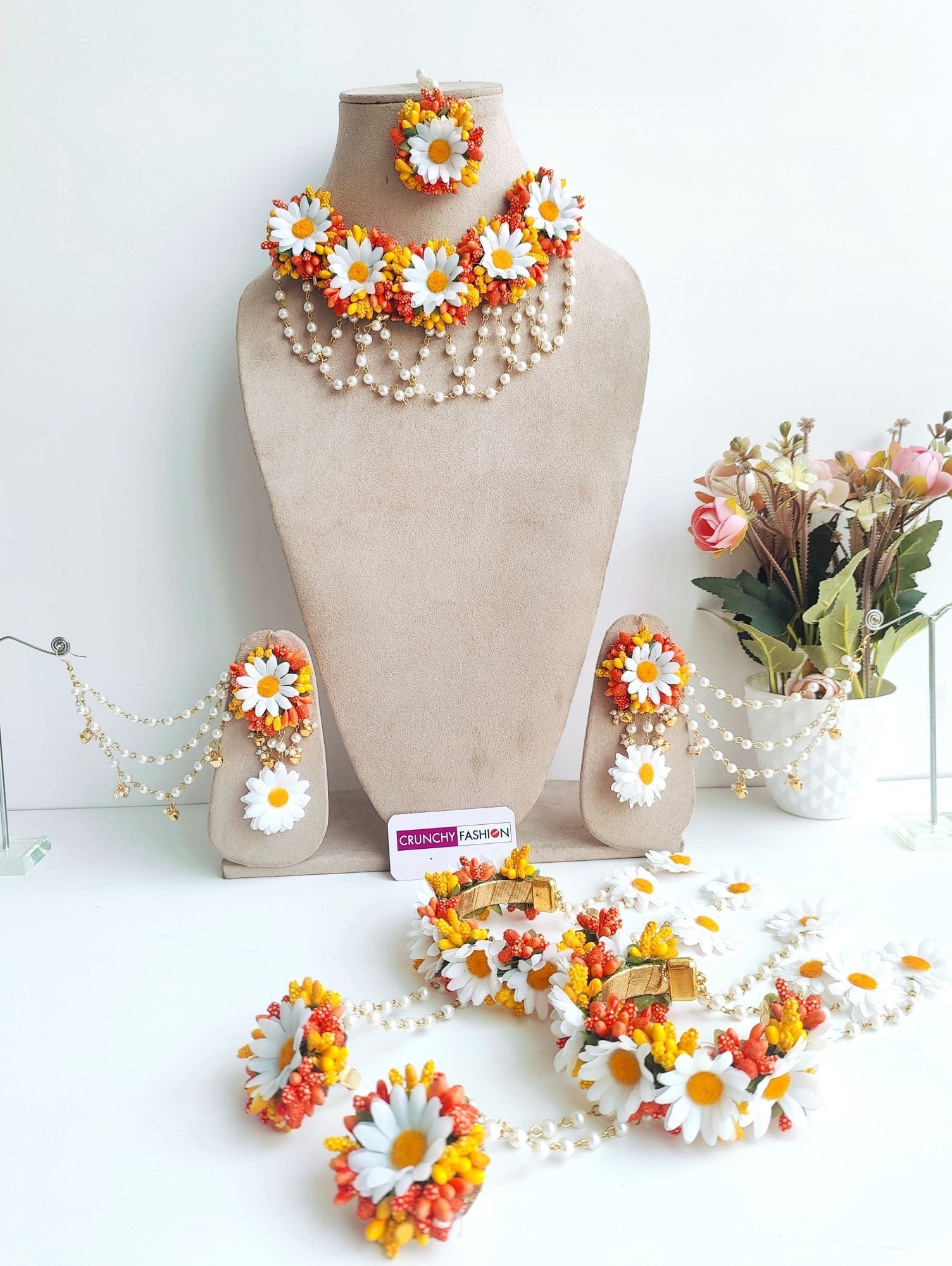 Designer orange & yellow floral-themed artificial flower jewellery set for mehndi ceremony, from Handicraft collection